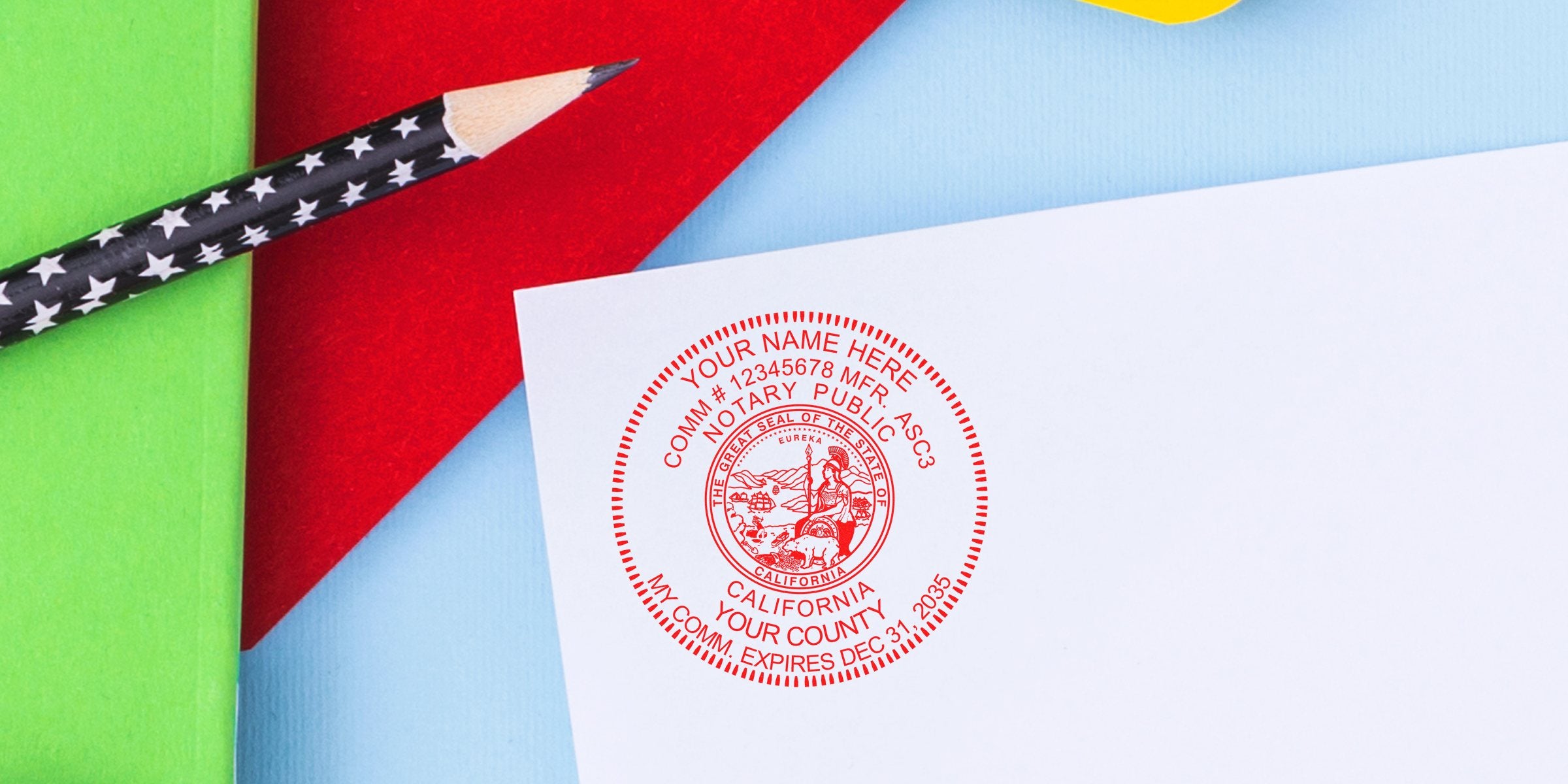 Red circular California notary public seal stamped on white paper, close-up with black star-pattern pencil and colorful green, red, blue background