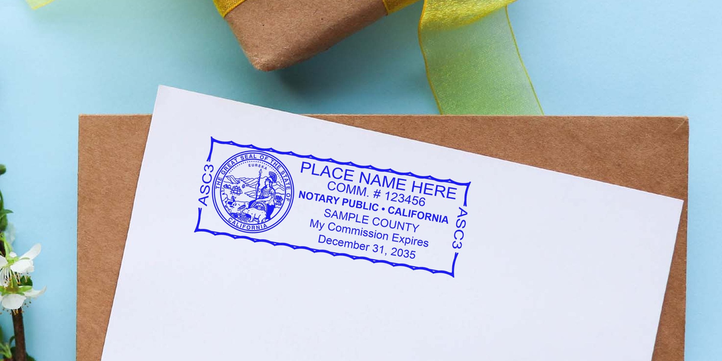 Blue California notary public stamp imprint on white paper over a brown envelope, showing placeholder name, commission number, Sample County and commission expiration date Dec 31, 2035