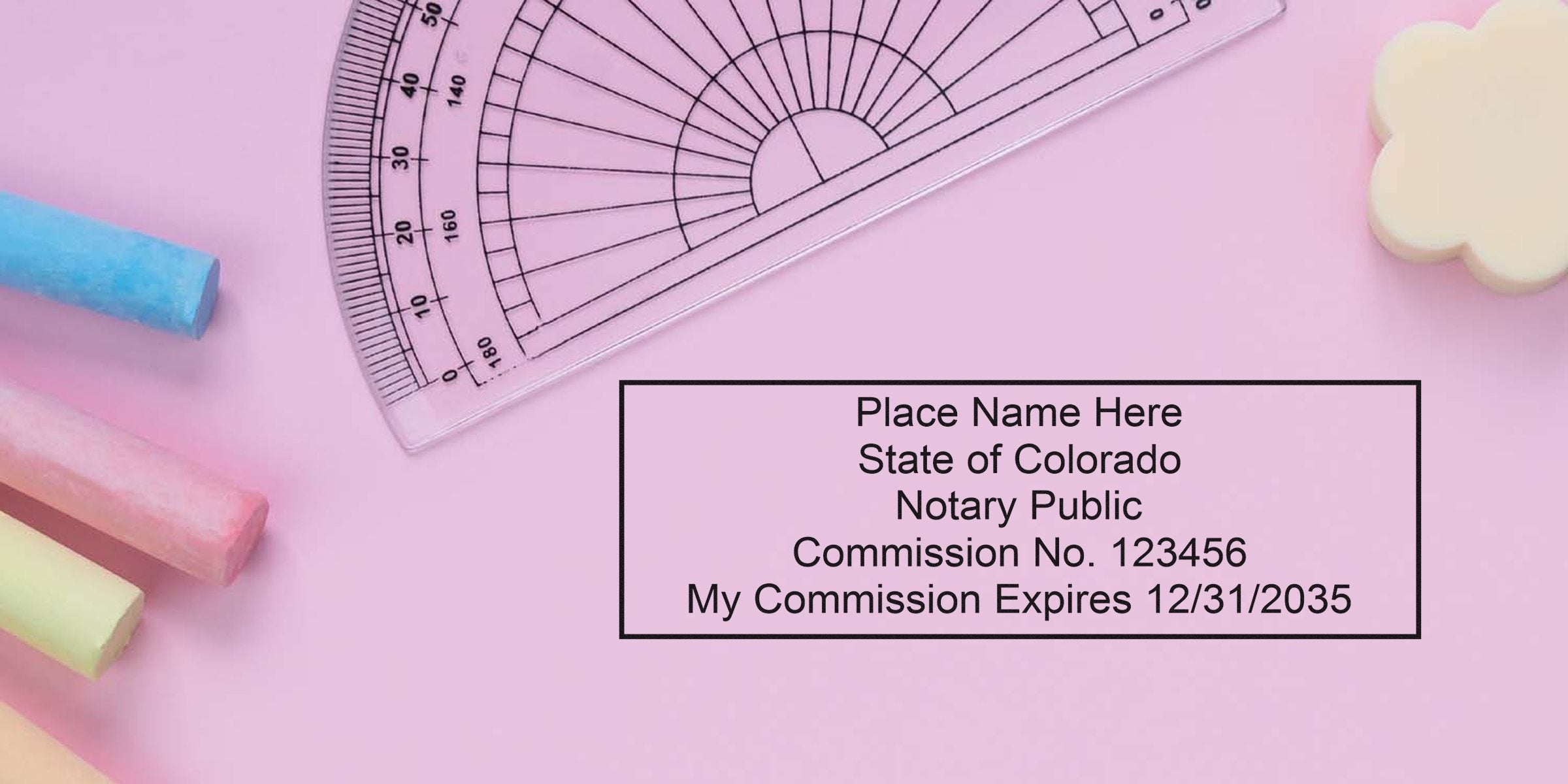 Pastel pink flatlay with protractor, colorful chalk sticks and a flower eraser beside a rectangular Colorado notary public stamp mockup reading commission number and expiry date