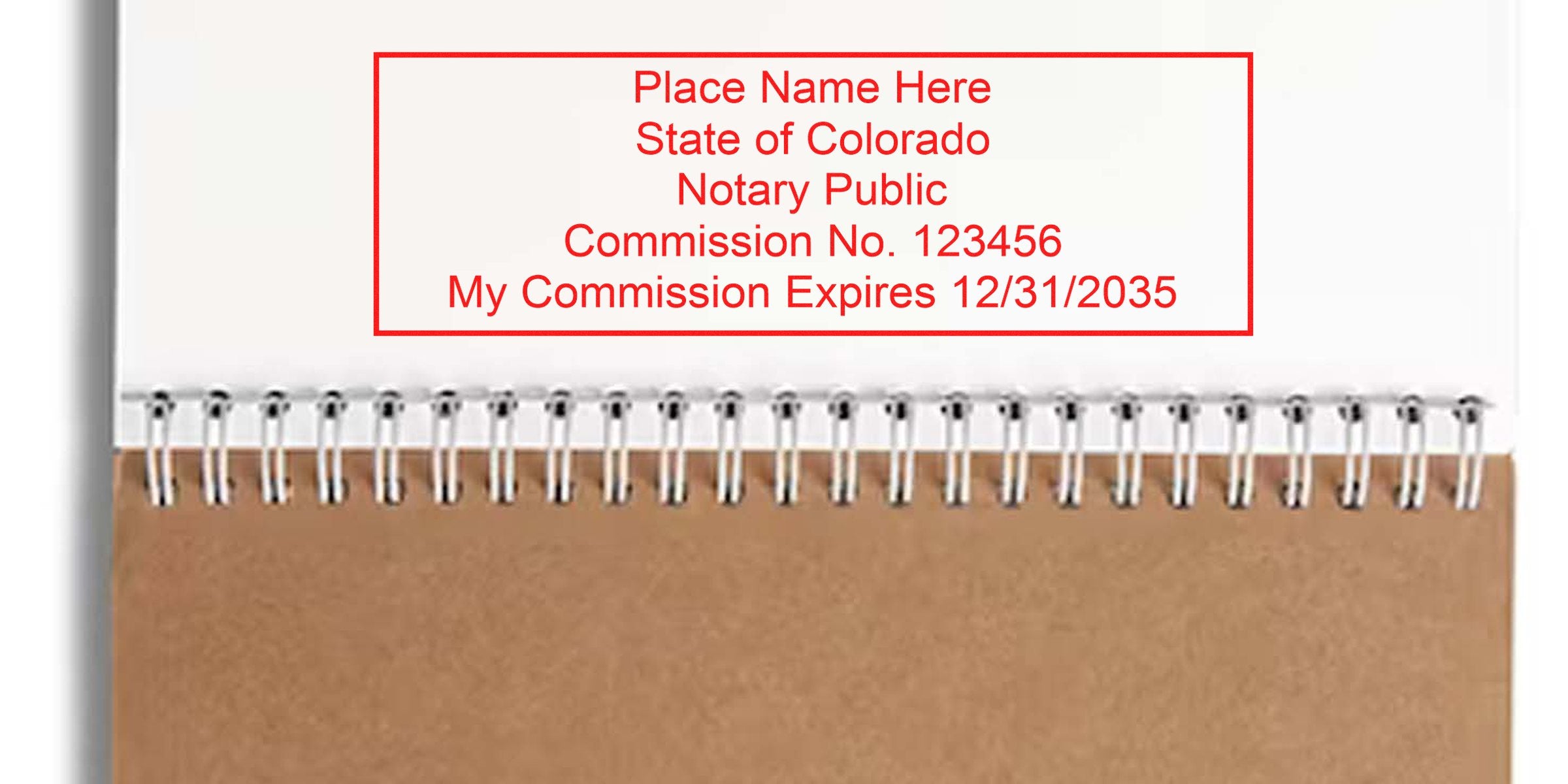 Red notary stamp mockup on notebook page reading "Place Name Here, State of Colorado, Notary Public, Commission No. 123456, My Commission Expires 12/31/2035" above a spiral-bound kraft paper notebook