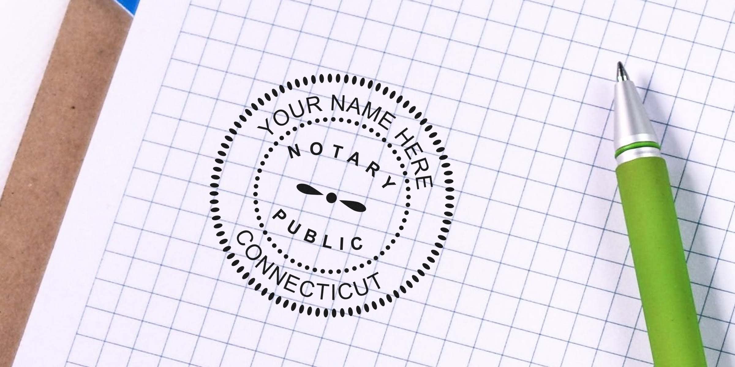 Notary public stamp mockup reading "Your Name Here - Notary Public - Connecticut" printed on graph paper beside a green pen