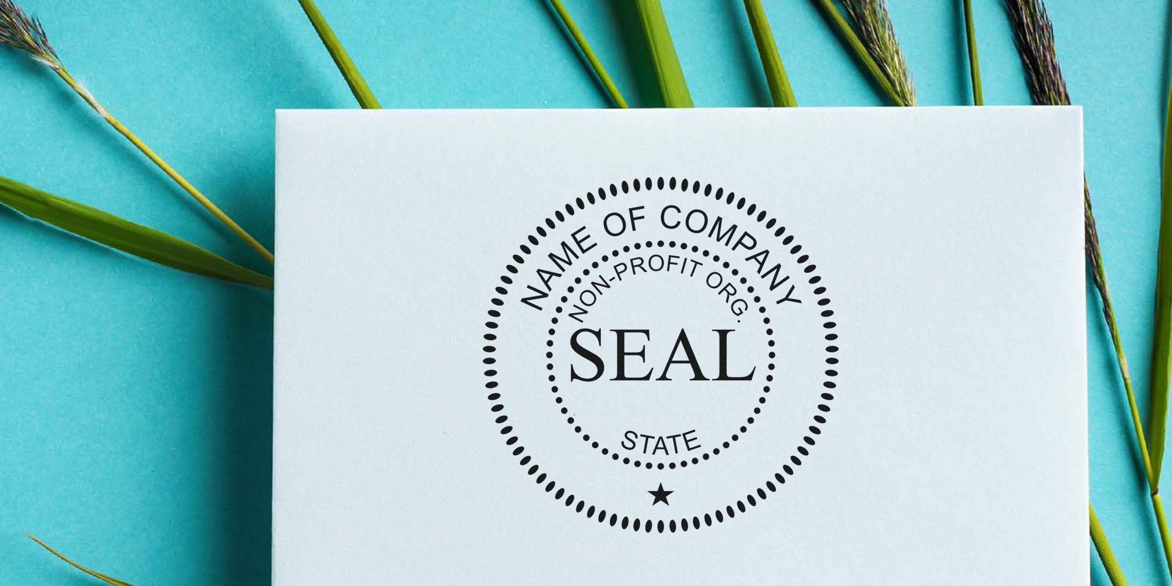 Circular seal stamp with the word SEAL in the center on a white card.