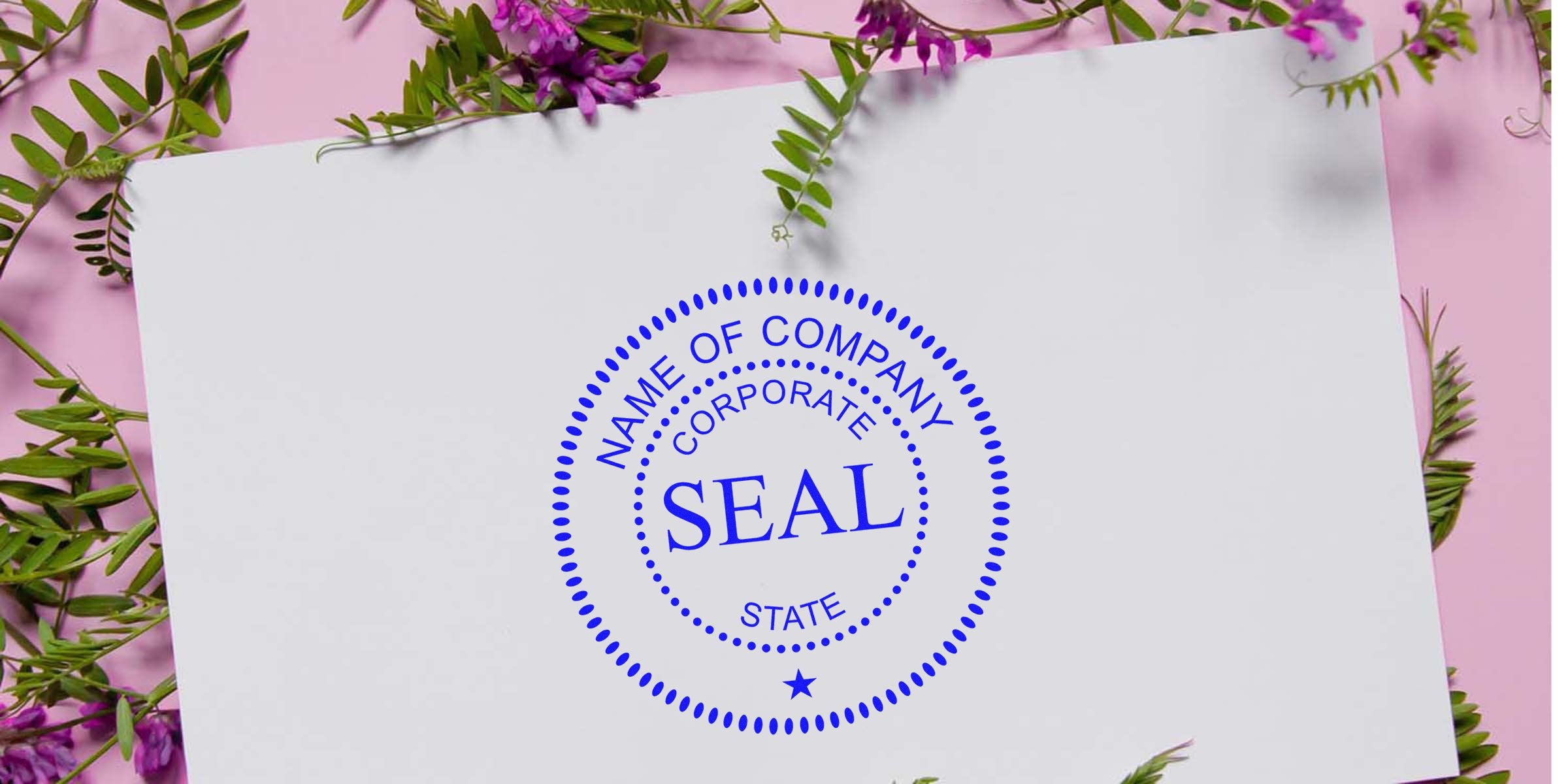 Blue circular company seal stamp on white paper with the word SEAL in the center and floral pink background.