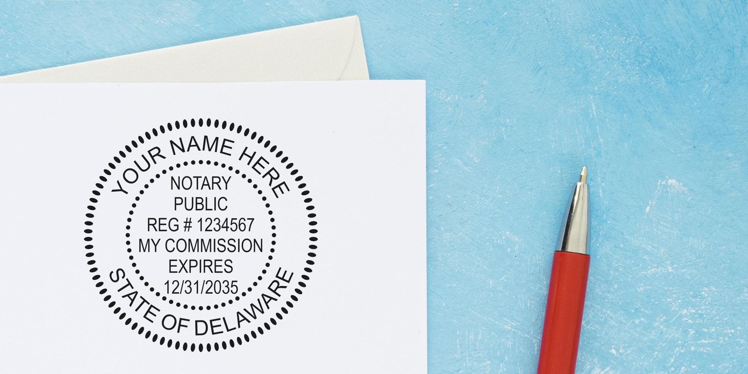 Close-up of white paper with circular notary public stamp mockup reading "YOUR NAME HERE" and commission details, red pen and envelope on blue textured background.