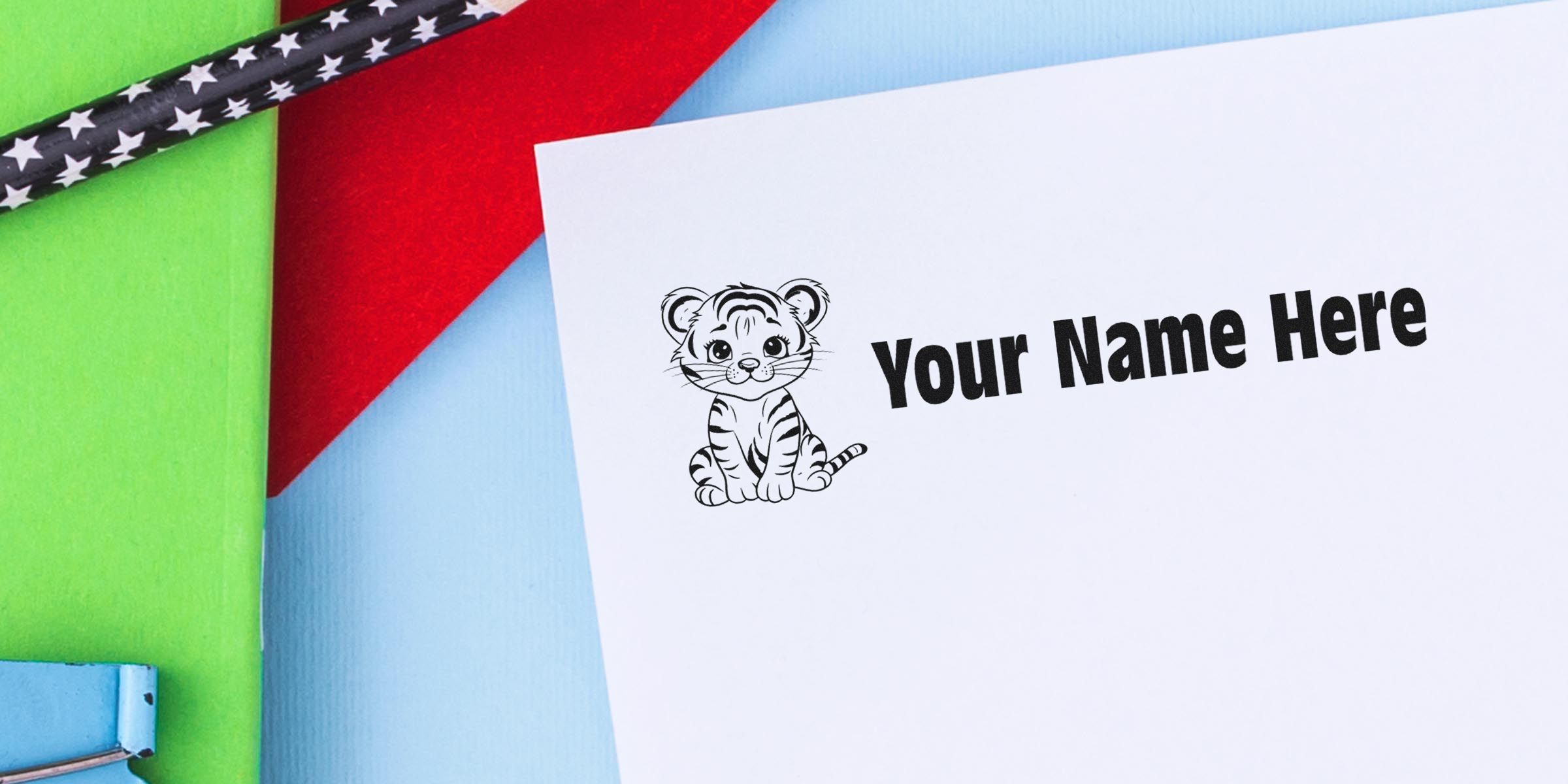 A white card with a cute tiger illustration and the bold text “Your Name Here” on a colorful background.