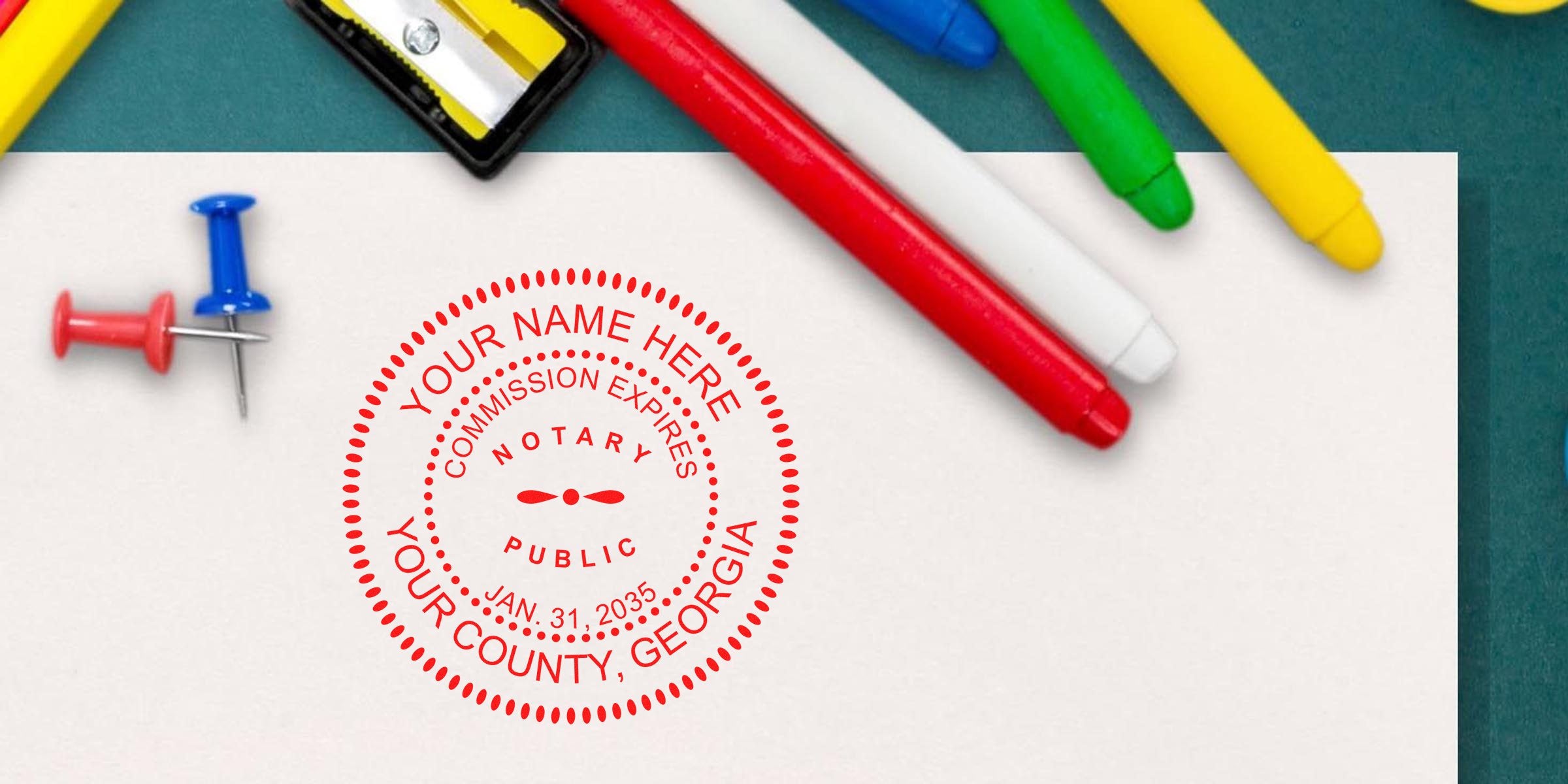 Top view of colorful markers, push pins and pencil sharpener on teal surface with white paper stamped by a red circular notary public seal reading "Notary Public" and placeholder county and expiration date