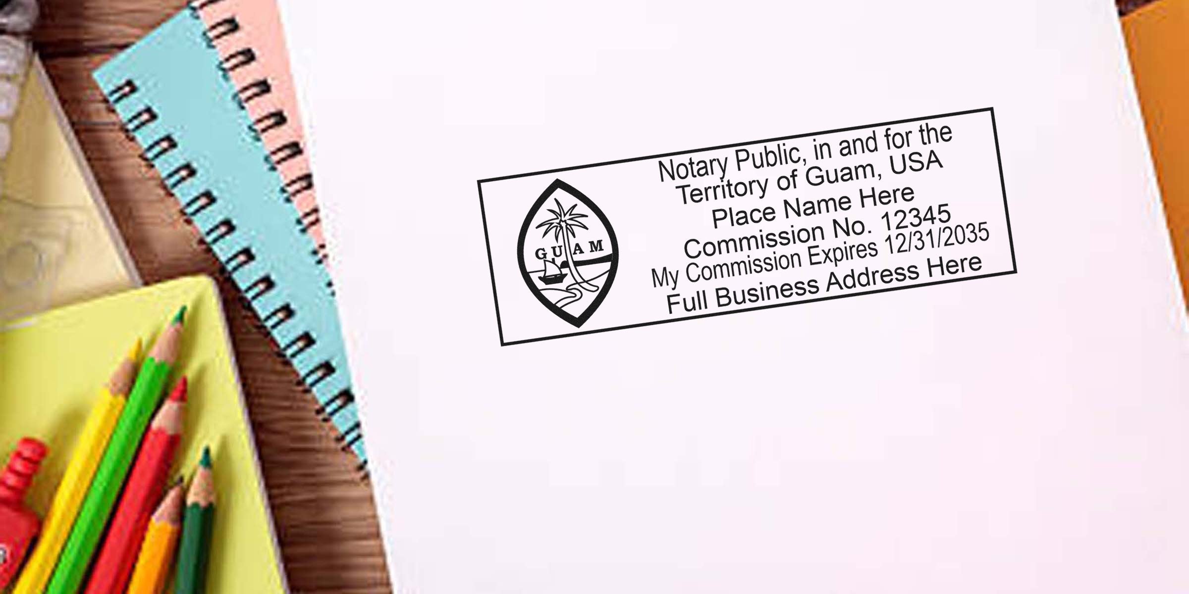 Envelope with a Guam notary public stamp imprint on white paper, surrounded by colored pencils and spiral notebooks on a wooden desk.