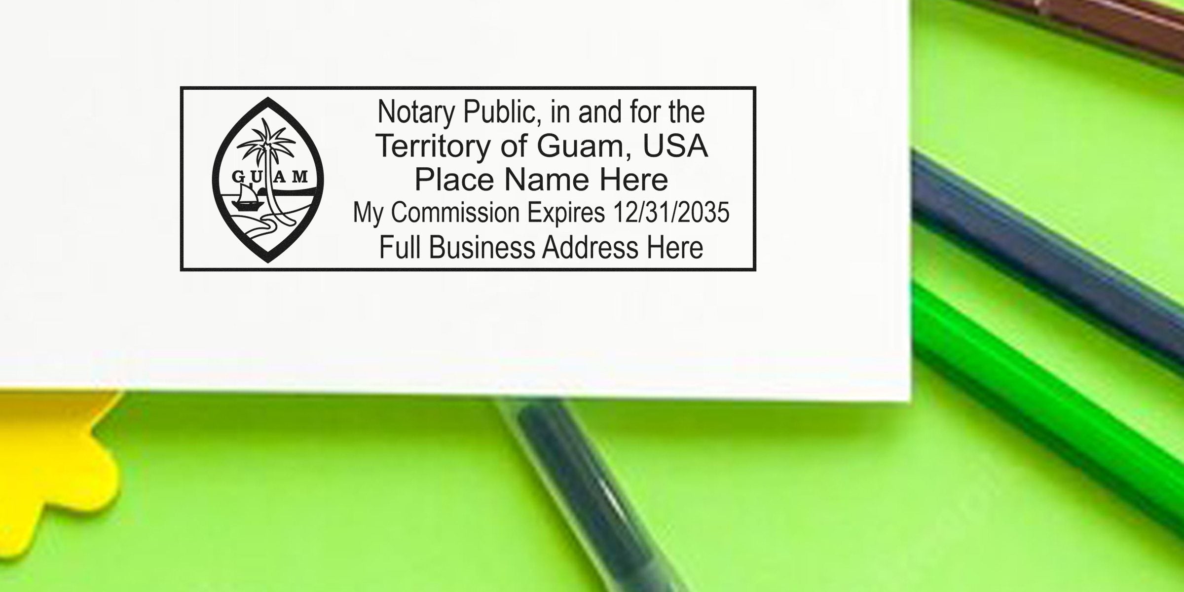 Rectangular notary public stamp for the Territory of Guam with seal, placeholder name, commission expiration 12/31/2035 and business address on white paper over green background with pens