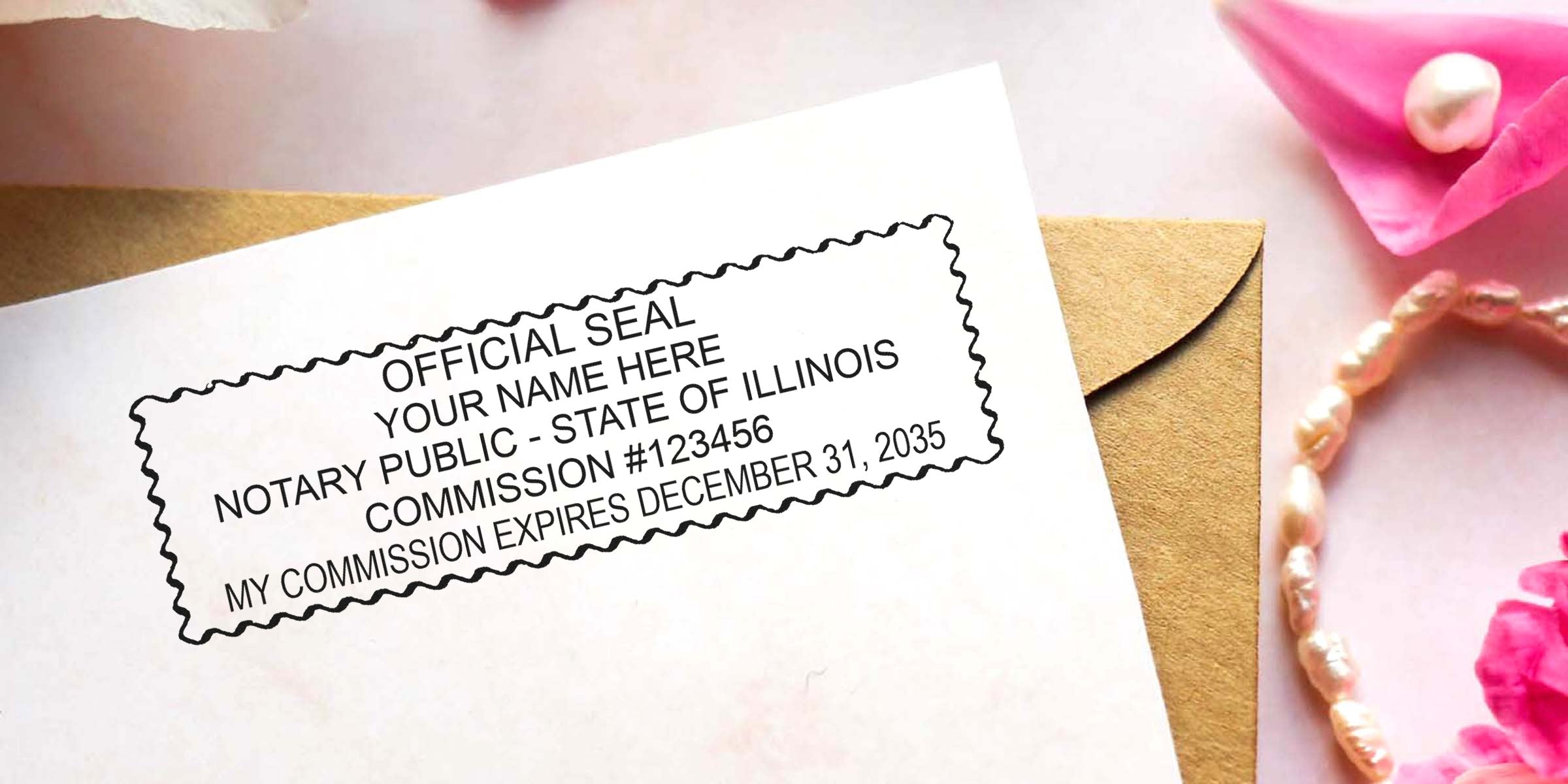 Rectangular notary stamp mockup reading "OFFICIAL SEAL YOUR NAME HERE NOTARY PUBLIC - STATE OF ILLINOIS COMMISSION #123456" printed on stationery beside a kraft envelope, pink flowers and a pearl bracelet — notary stamp template
