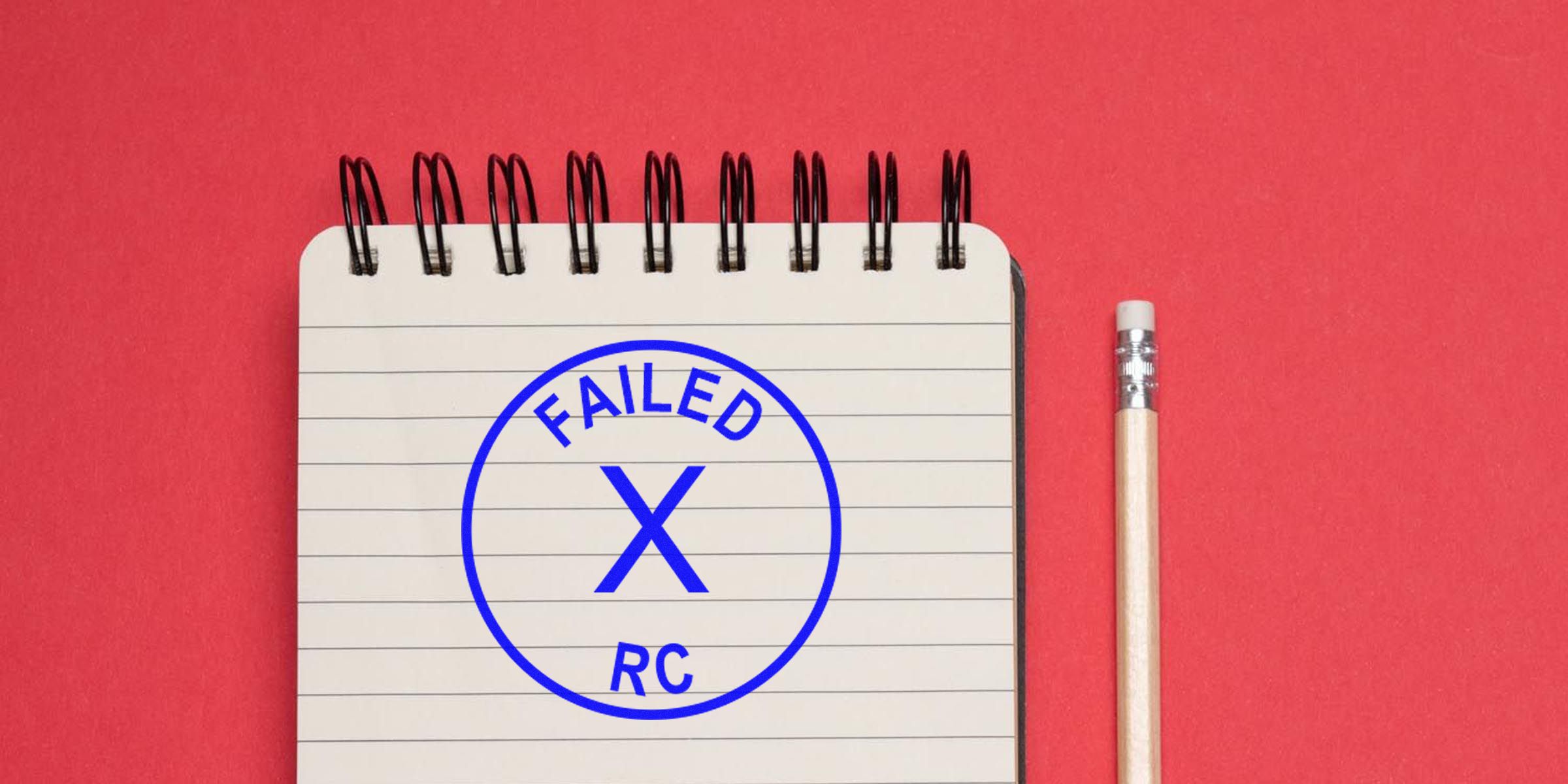 A spiral notebook page on a red background with a blue circular stamp reading “FAILED” around a large X, and the letters “RC” inside the circle.