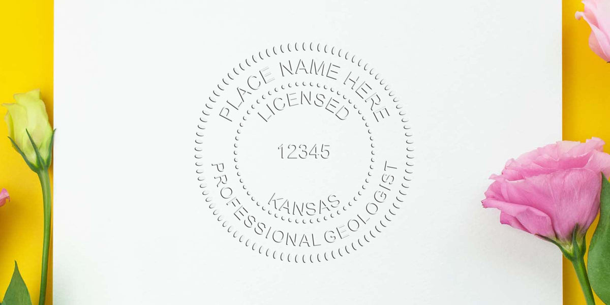 Kansas geologist stamp impression on white paper with flowers on a yellow background.