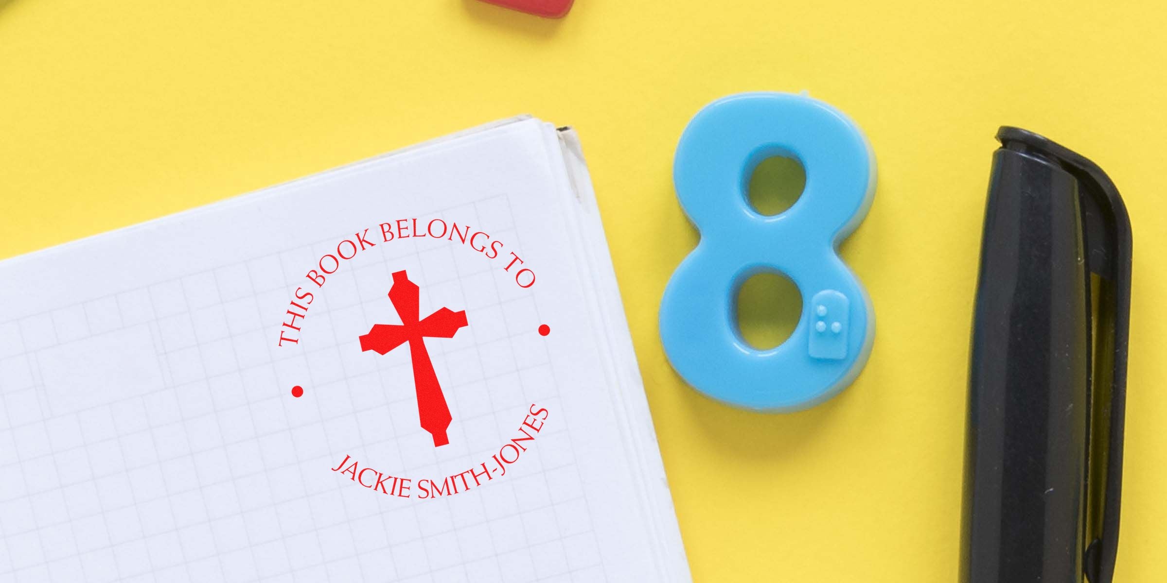 Notebook page with red ownership stamp reading “This book belongs to Jackie Smith-Jones.”