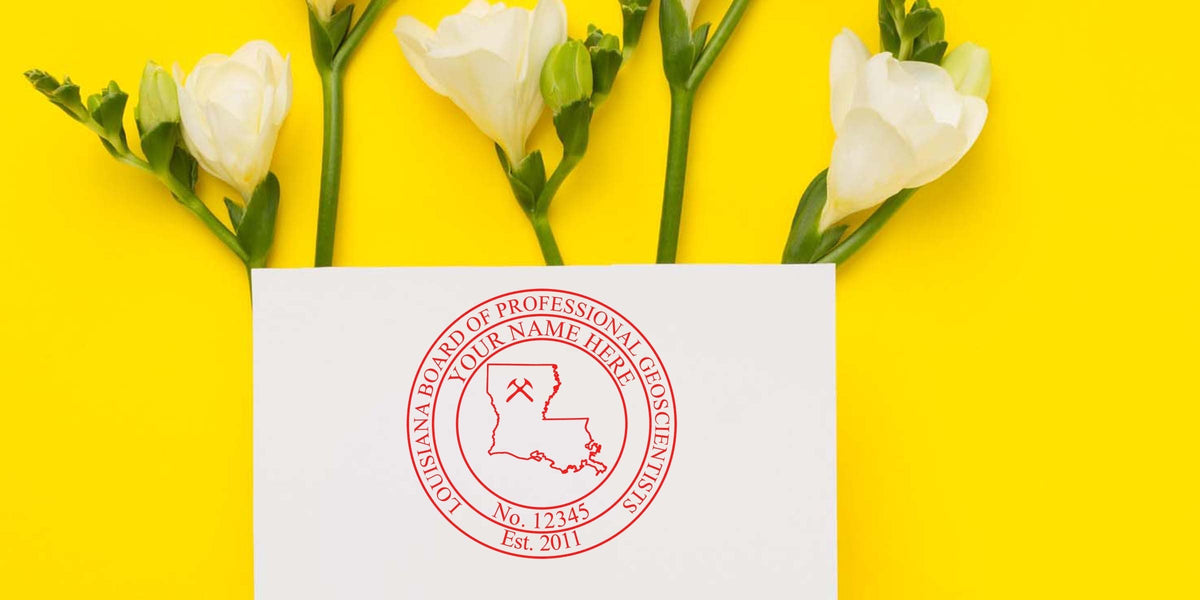 Louisiana geologist seal on a white card with white flowers and a bright yellow background.