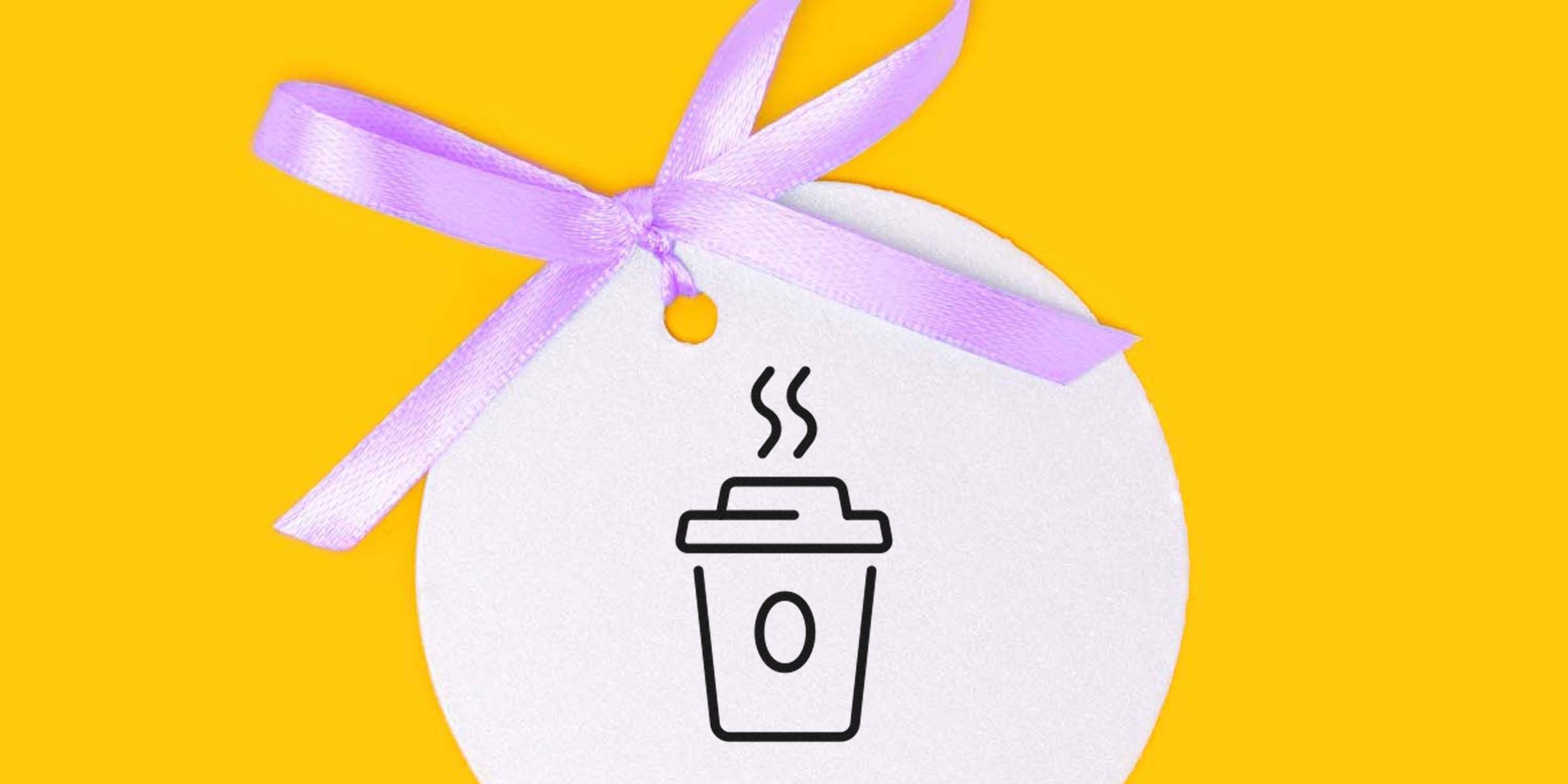 Gift tag with a purple ribbon and a coffee cup icon on a bright yellow background.
