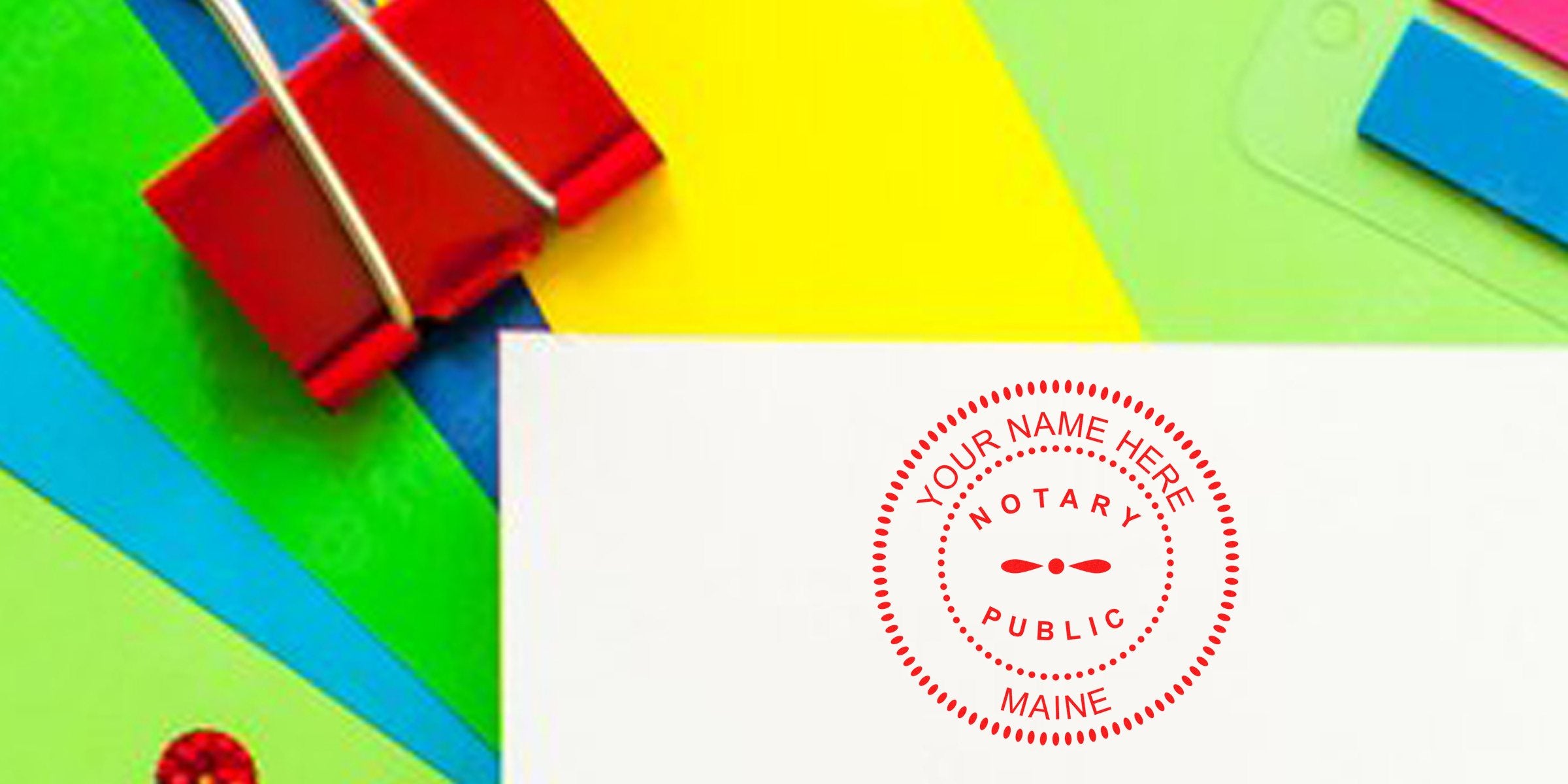 Red circular notary public seal stamped "Your Name Here, Maine" on white envelope surrounded by colorful office supplies and a red binder clip, bright modern stationery background for notary, legal documents, mail and office organization visuals