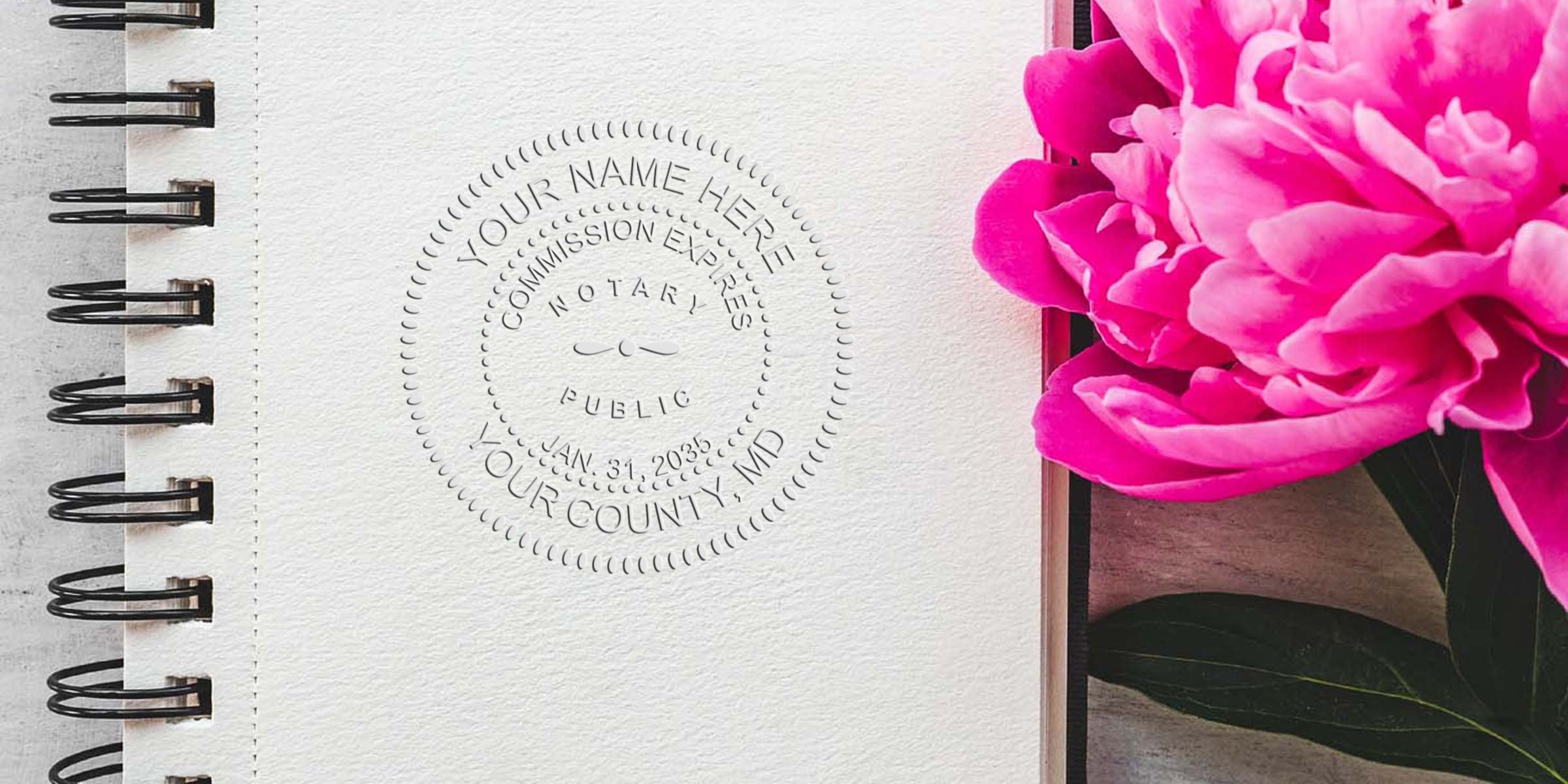 Spiral-bound textured notepad with an embossed notary seal stamp on the page alongside a bright pink peony flower—stationery mockup for notary, legal documents, journaling, or floral desk flatlay.