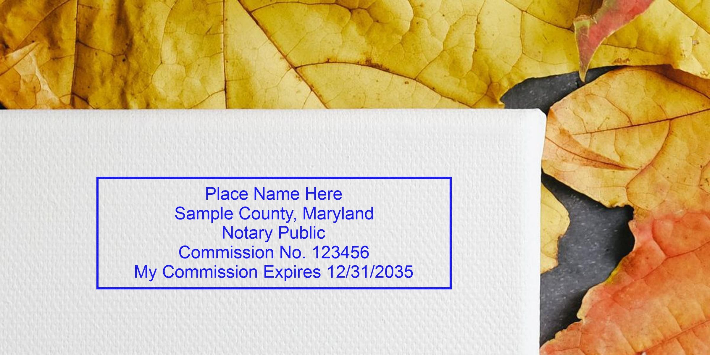 Rectangular blue notary stamp mockup reading "Place Name Here, Sample County, Maryland, Notary Public, Commission No. 123456, My Commission Expires 12/31/2035" on textured white paper with yellow and orange autumn leaves background