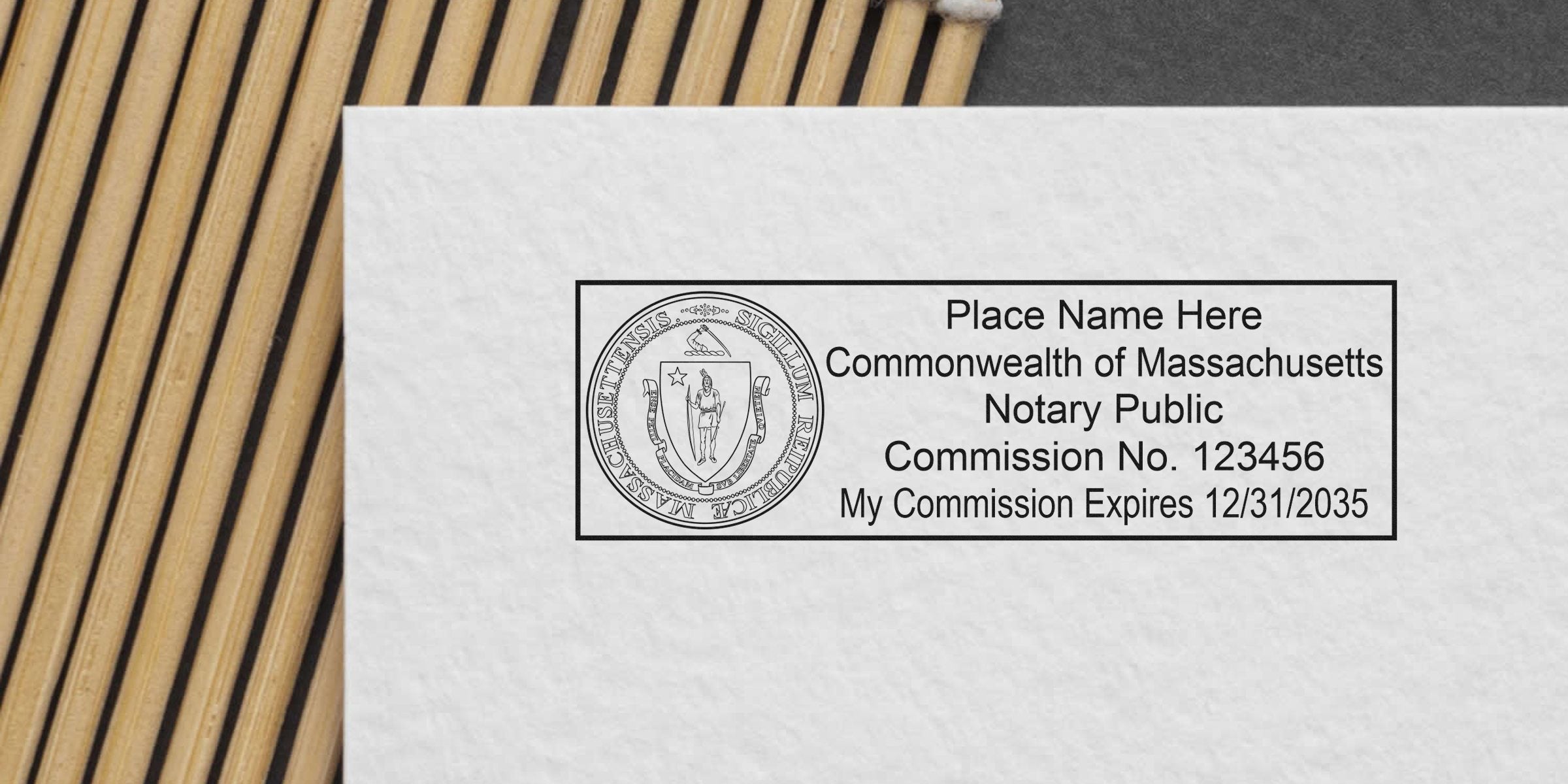 Massachusetts notary public stamp mockup on textured paper showing state seal, placeholder name, commission number and expiration date (12/31/2035)