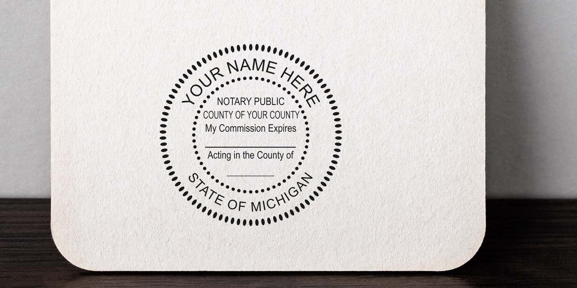Round notary public seal stamp template on textured paper reading "Your Name Here" and "State of Michigan" with commission, county and acting-in-the-county lines for customization