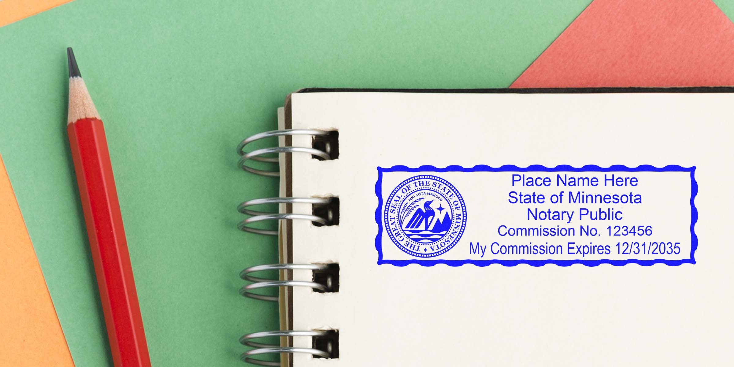 Blue Minnesota notary public stamp on a spiral-bound notebook page with commission number and expiration date, red pencil and colorful paper background — close-up stationery image for notary, legal, office, and document services SEO.