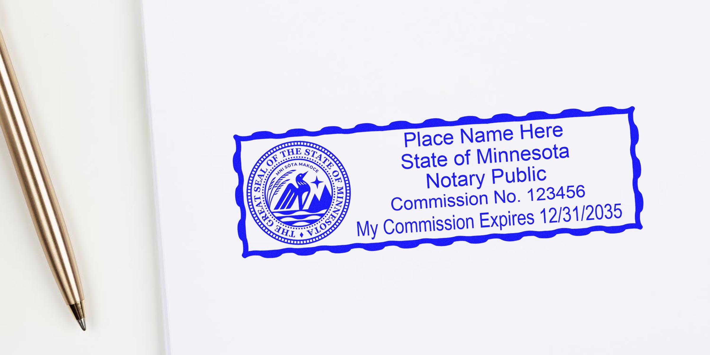 Blue Minnesota notary public stamp in blue ink with state seal, sample name, commission number and commission expiration date beside gold pen on white paper