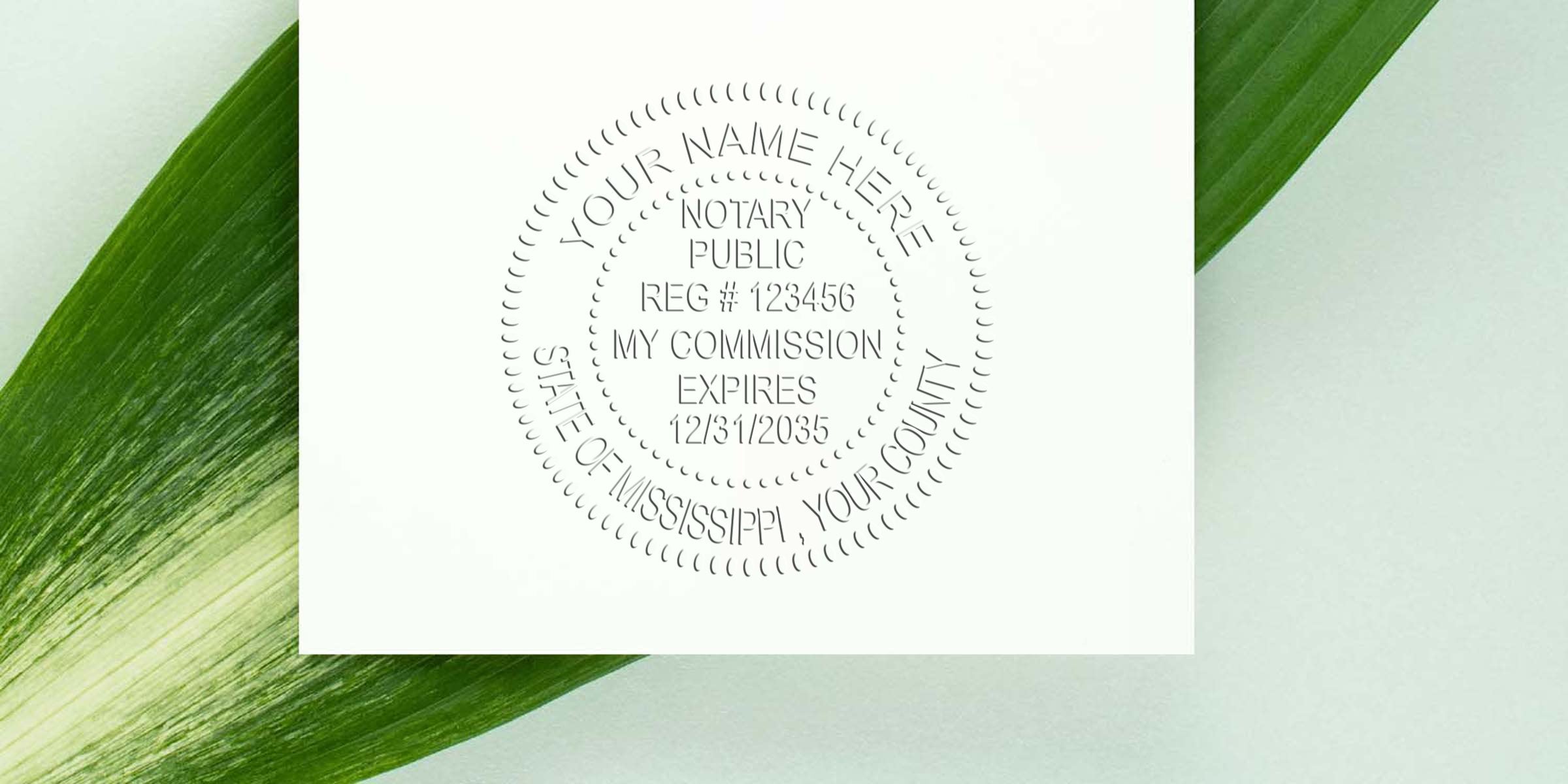 Embossed notary public seal on white paper showing registration number and commission expiry, photographed on a green leaf background