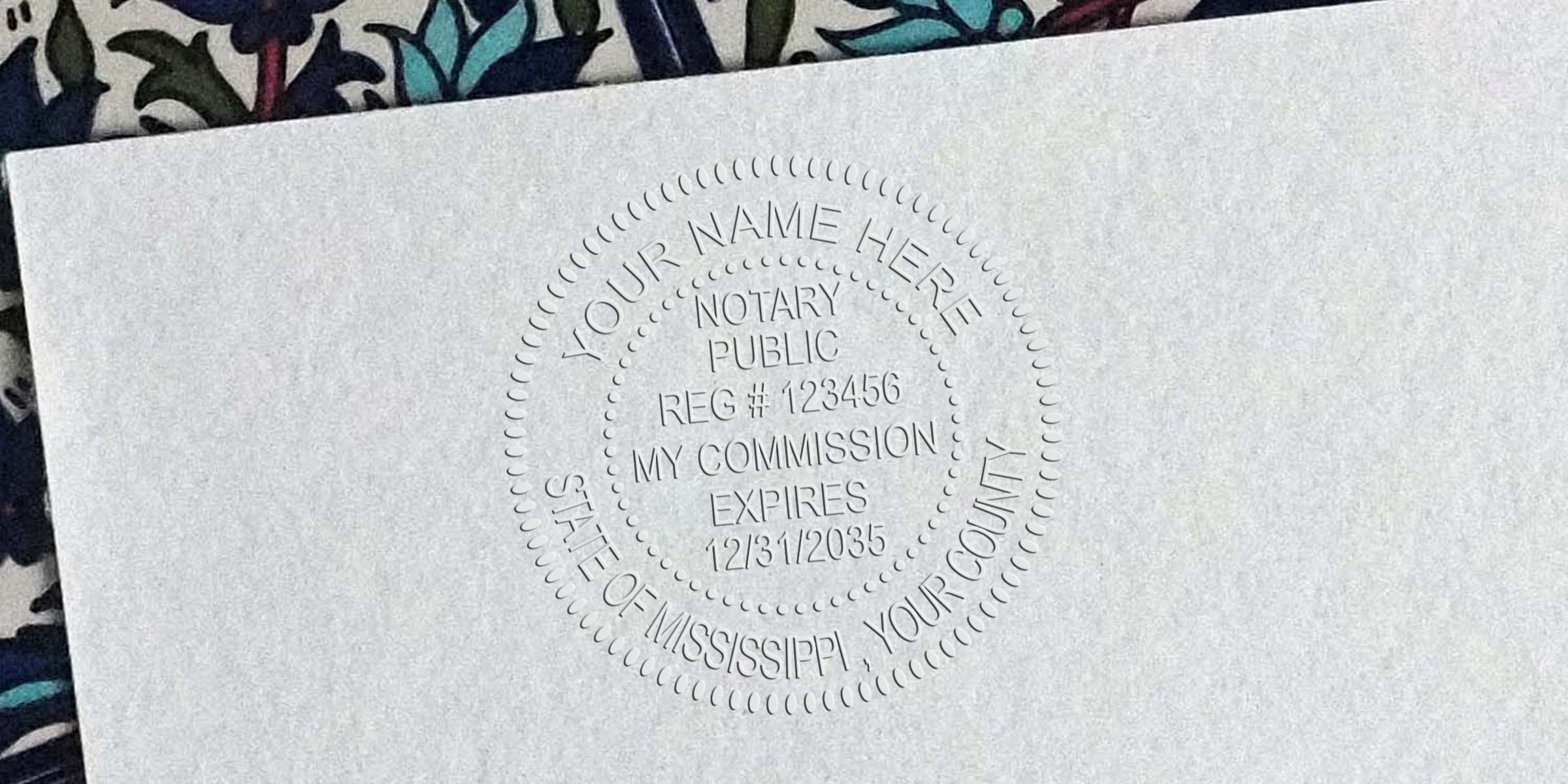 Embossed notary public seal impression on white paper reading "Notary Public, Reg #123456, My Commission Expires 12/31/2035, State of Mississippi" with decorative circular border
