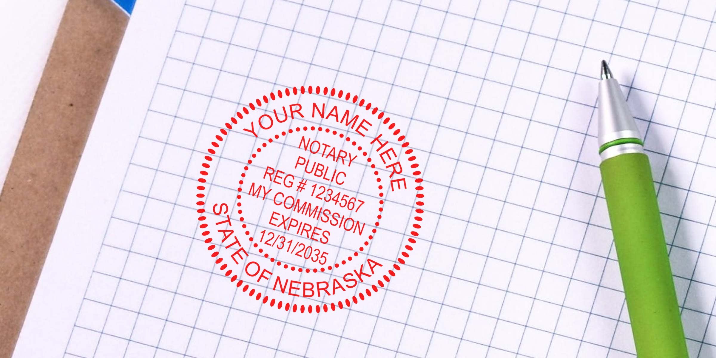 Red notary public stamp reading "State of Nebraska" and expiration details on graph paper beside a green pen and clipboard, document authentication concept