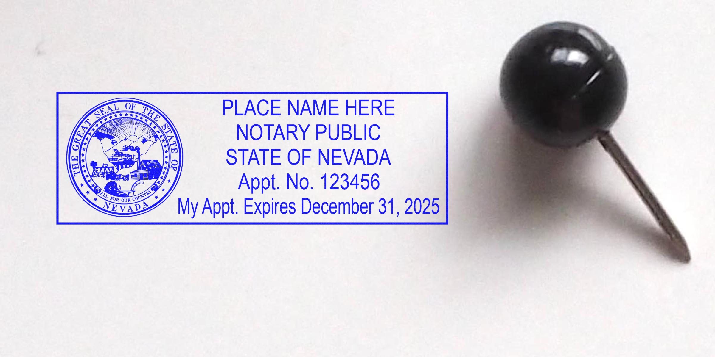 Blue notary public stamp impression with Nevada state seal, placeholder name, appointment number and expiration date (Dec 31, 2025) stamped on white paper, shown next to a black pushpin.