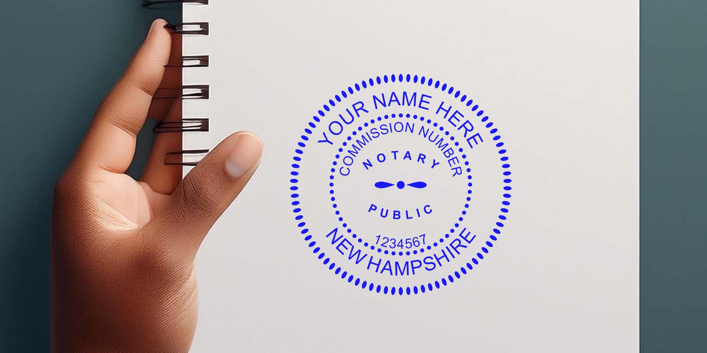 Hand holding a spiral-bound notebook showing a blue circular notary public stamp on a white page reading "Your Name Here — Commission Number — Notary Public — New Hampshire."