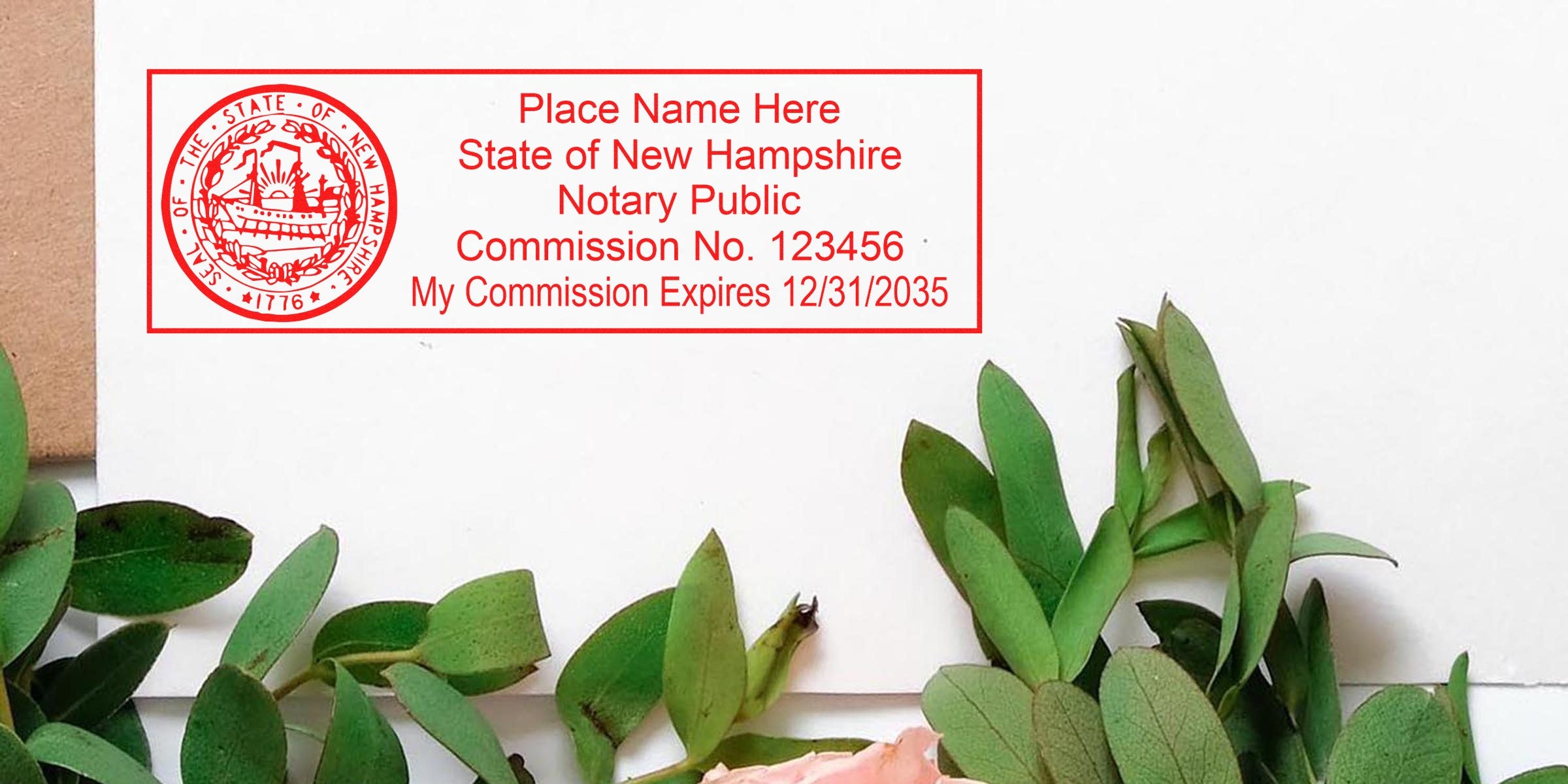 White envelope with red State of New Hampshire notary public stamp mockup in top left, surrounded by green eucalyptus leaves and a pink flower