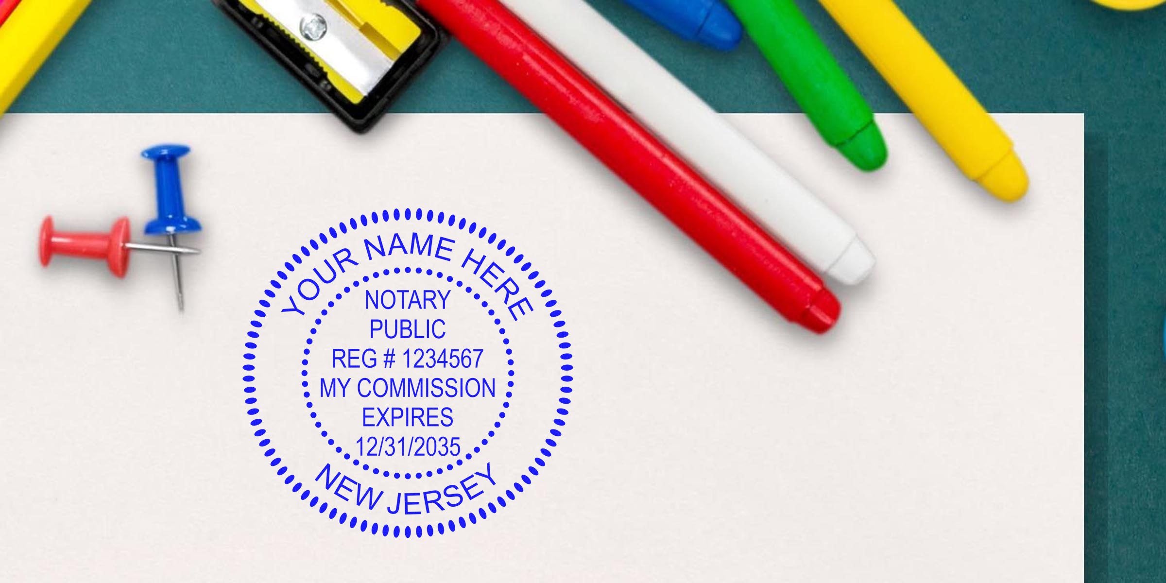 Blue New Jersey notary public stamp on white paper with colorful markers, push pins and pencil sharpener, office supplies notary stamp mockup