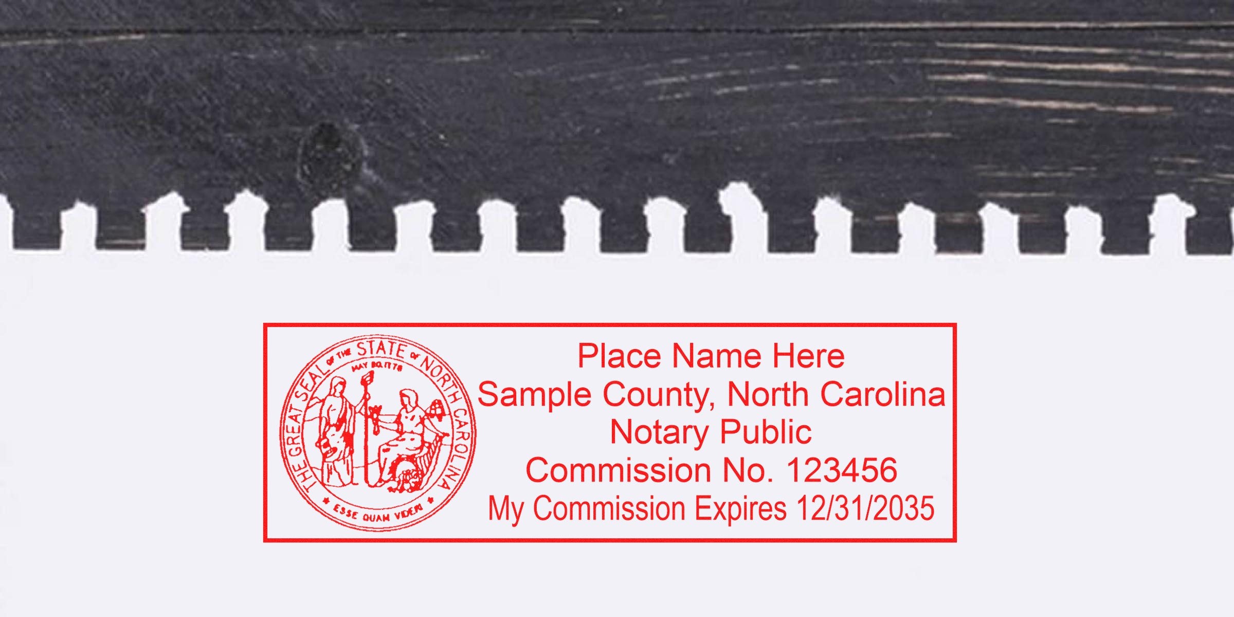 Red rectangular North Carolina notary stamp in red ink showing state seal, sample county name, notary public, commission no. and expiration date on torn-edge white paper