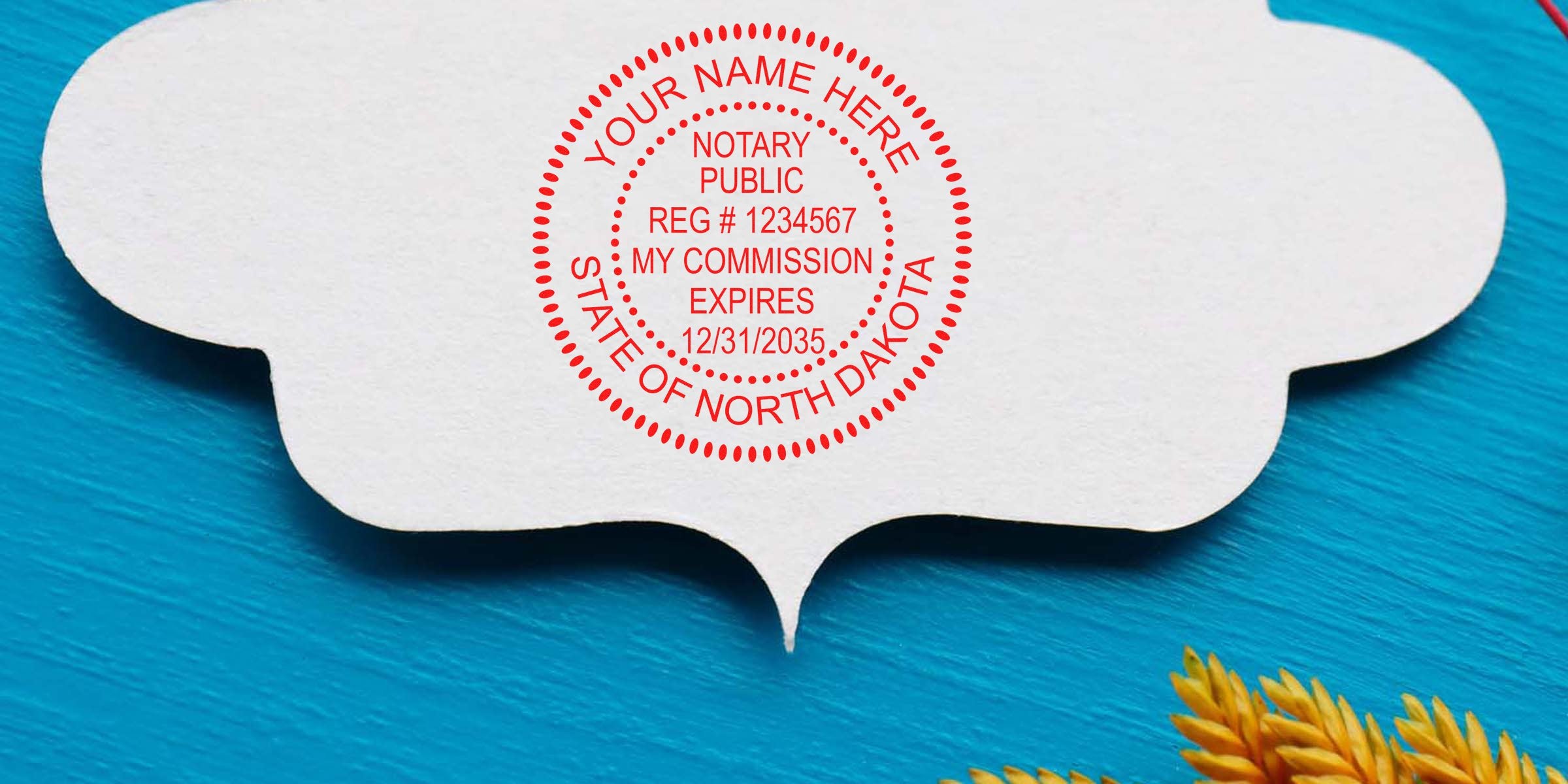 White paper speech-bubble cutout with red circular notary public stamp reading "State of North Dakota" on bright blue wooden background with golden wheat corner.