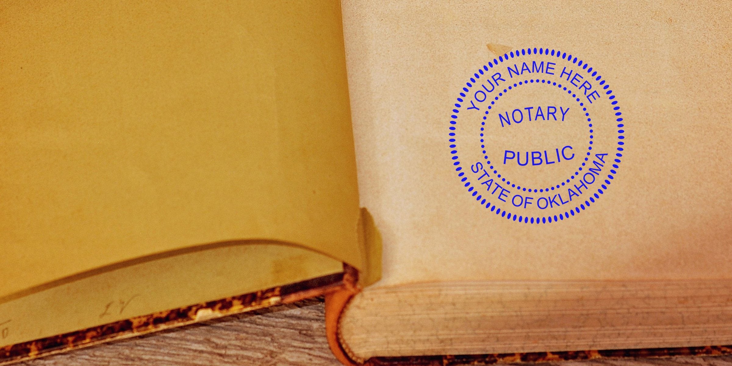 Open vintage book on wooden table with circular blue "Notary Public - State of Oklahoma" stamp on a blank page