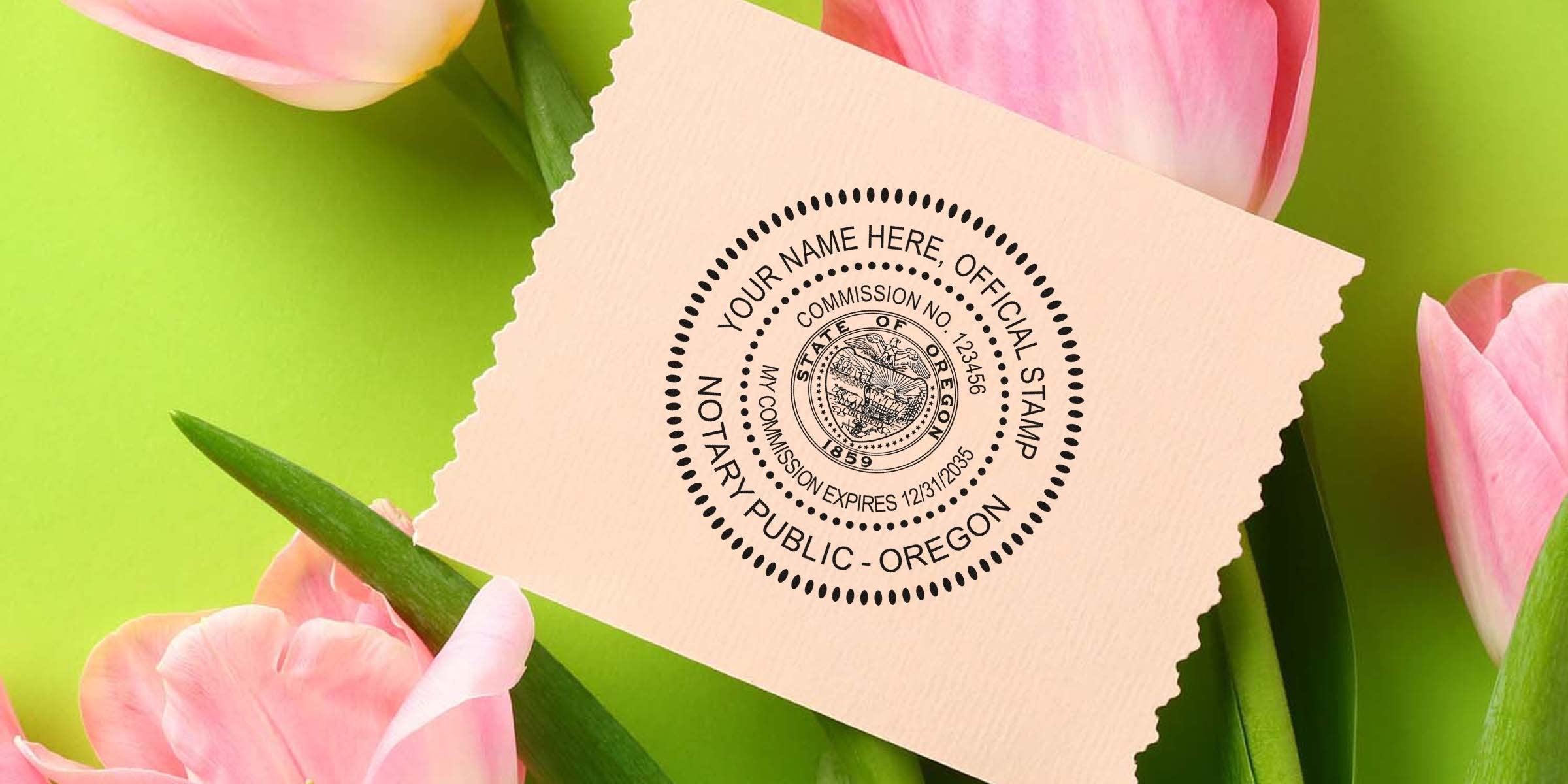 Customizable Oregon notary public round seal stamped on torn pink cardstock, surrounded by pink tulips on bright green background — legal stamp stationery floral flatlay