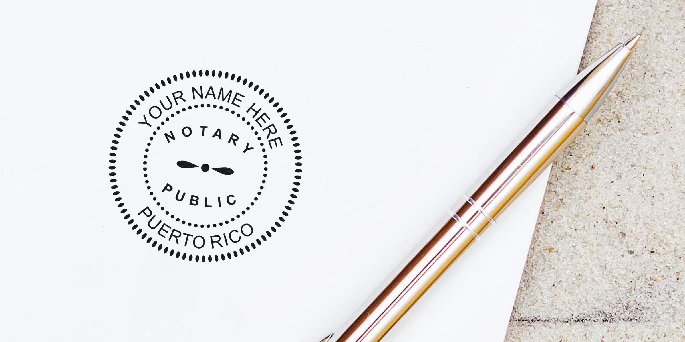 Rose-gold ballpoint pen beside a black circular "Notary Public Puerto Rico" stamp mockup with customizable name on white paper