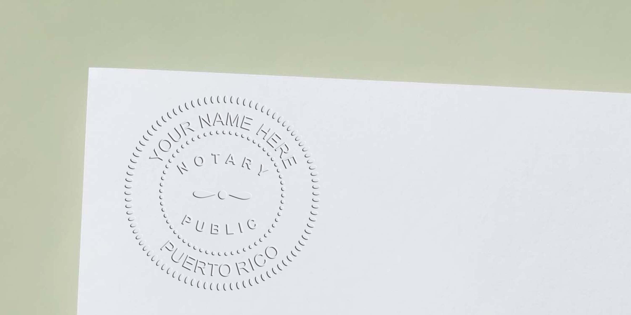 Close-up of an embossed round notary public seal on white paper reading "Your Name Here - Notary Public - Puerto Rico" with a soft green background.