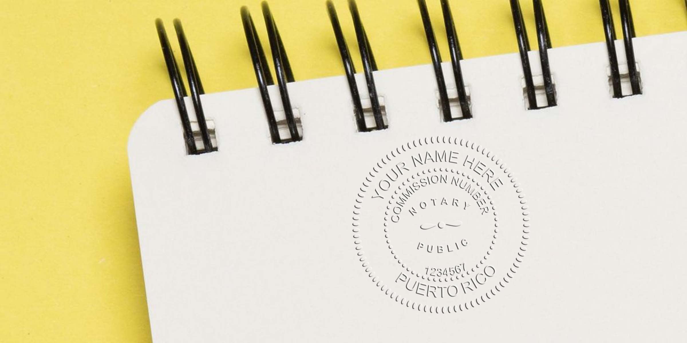 Spiral-bound white notebook on yellow background with an embossed notary public seal reading "Puerto Rico" and placeholder name, close-up of paper texture and binding.