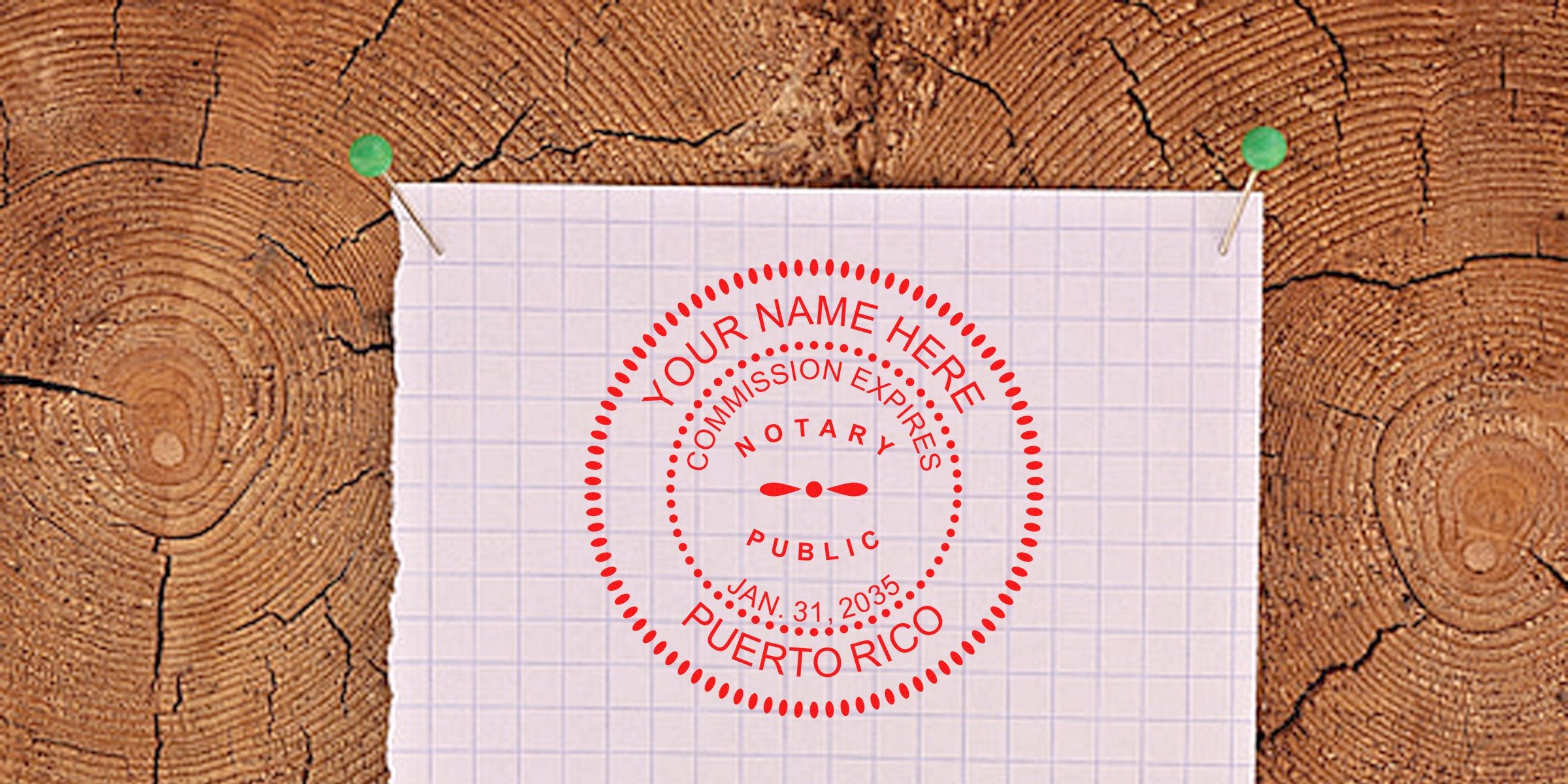 Red circular notary public stamp reading "Your Name Here, Puerto Rico, Commission Expires Jan. 31, 2035" on grid paper pinned to a wooden log background