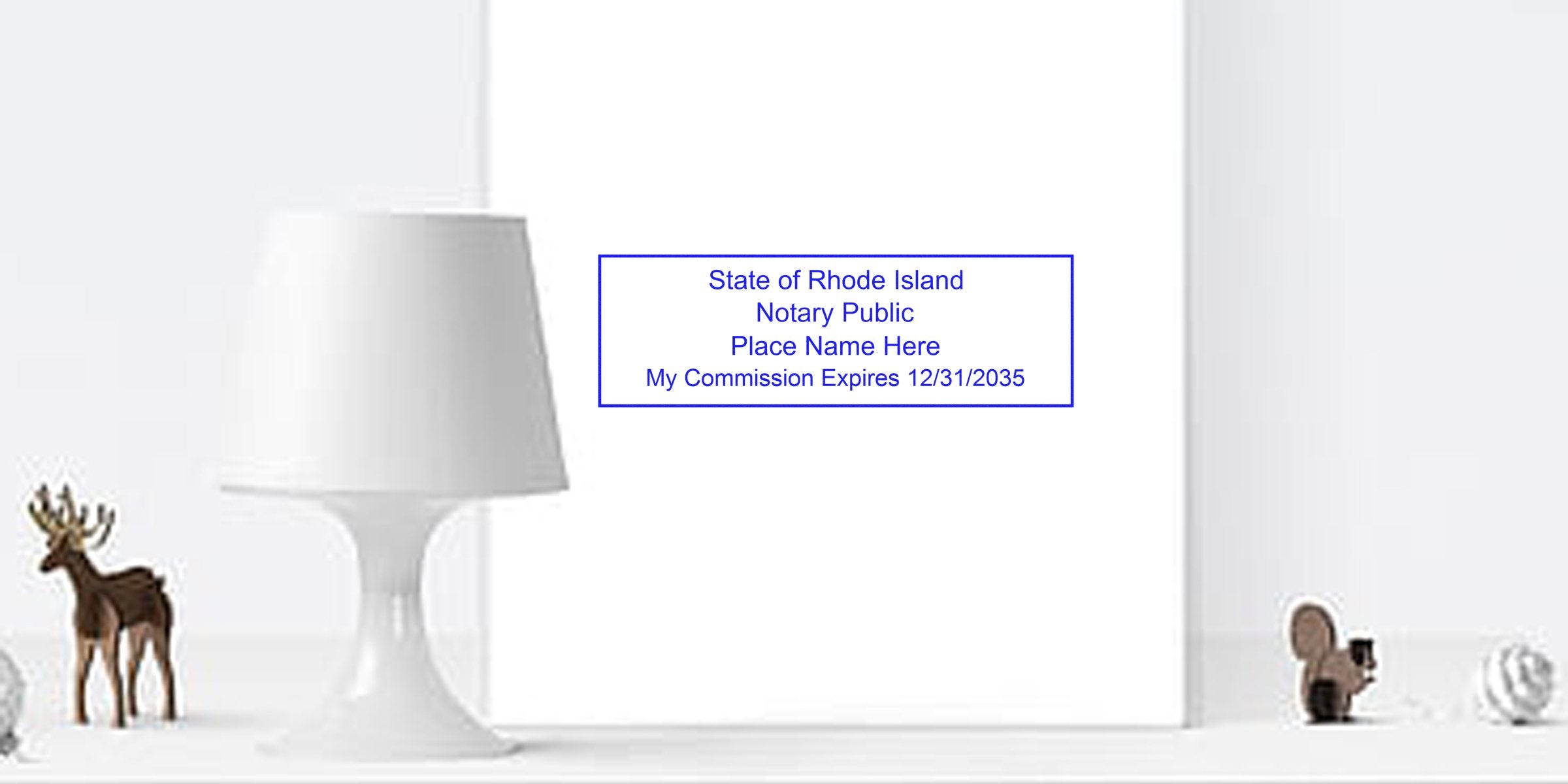 Minimalist white tabletop scene with a modern white lamp, small deer and mouse figurines, and a blue Rhode Island notary public stamp mockup reading commission expires 12/31/2035.