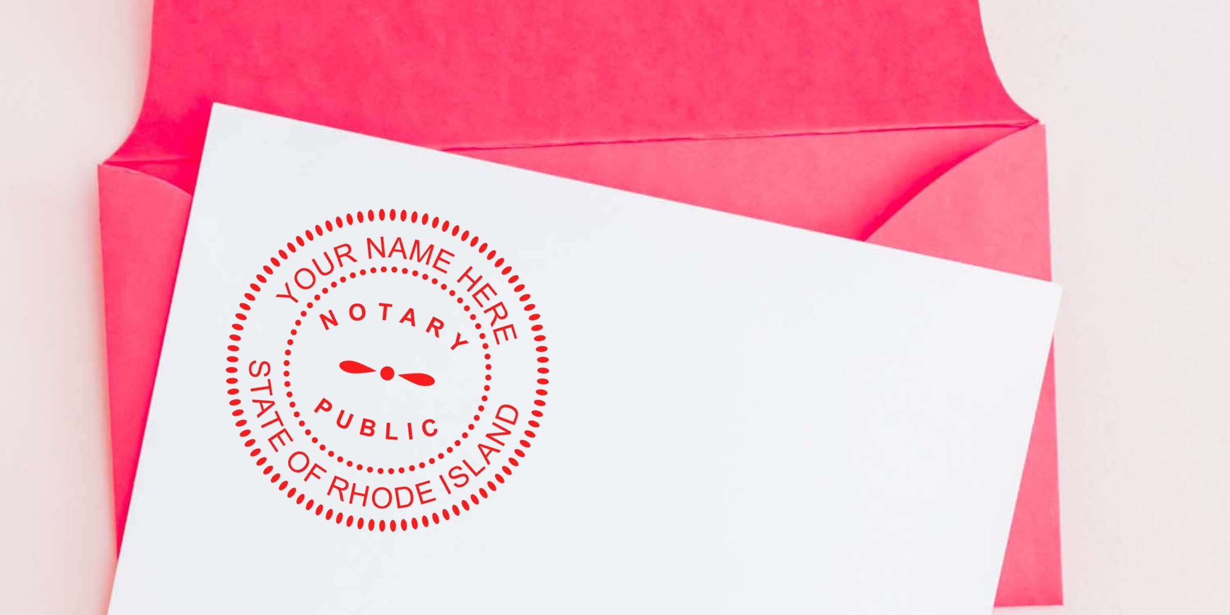 White card with red circular notary public seal reading "State of Rhode Island" placed inside a pink-red envelope, flat-lay stationery image highlighting legal stamp detail.