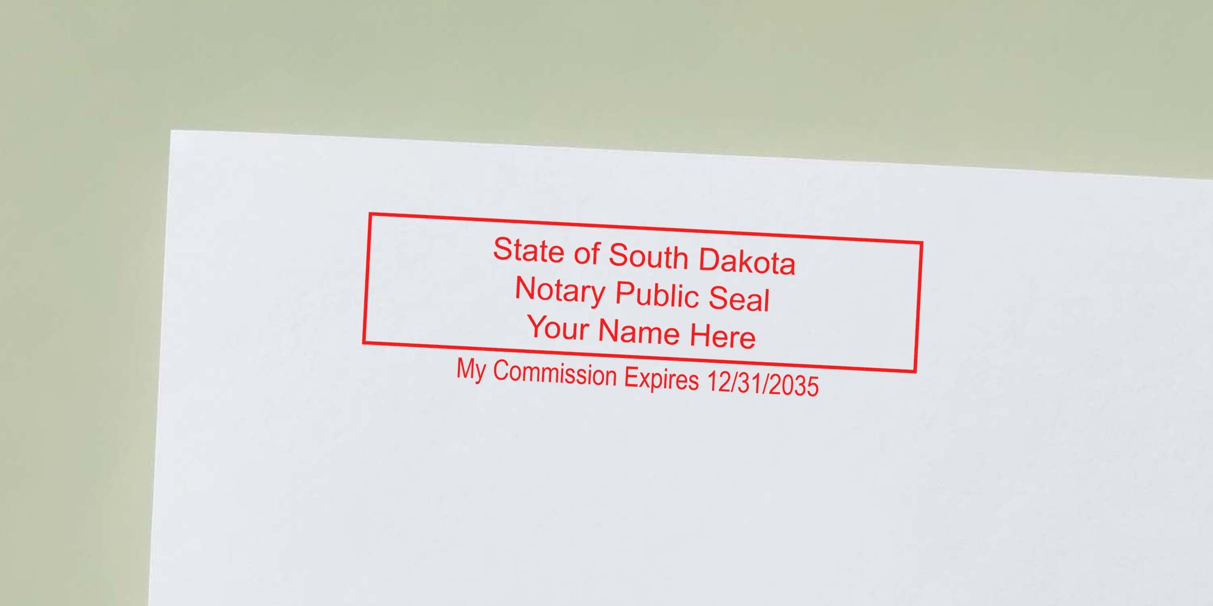 Red rectangular notary public seal stamped on white paper reading "State of South Dakota Notary Public Seal Your Name Here" with commission expires 12/31/2035.