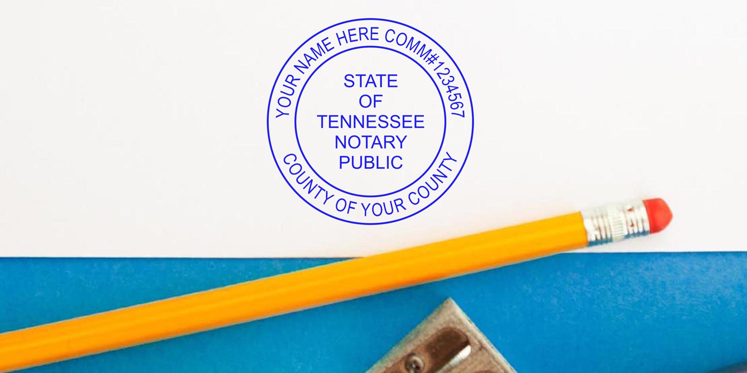Blue Tennessee notary public round seal stamped on white paper next to a yellow pencil and metal pencil sharpener on a blue background