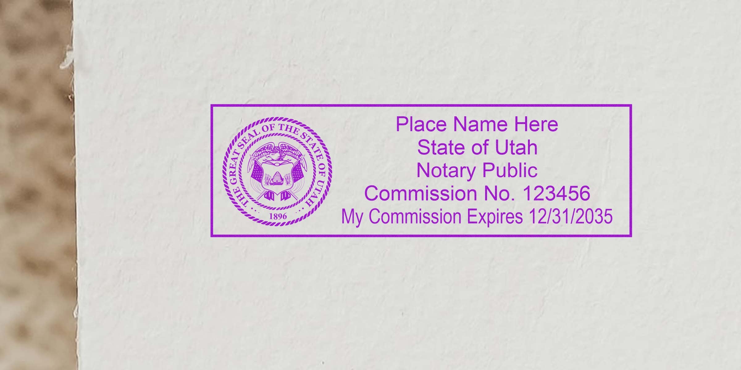 Purple rectangular Utah notary public stamp on white paper showing state seal, placeholder name, commission number and commission expiration date.