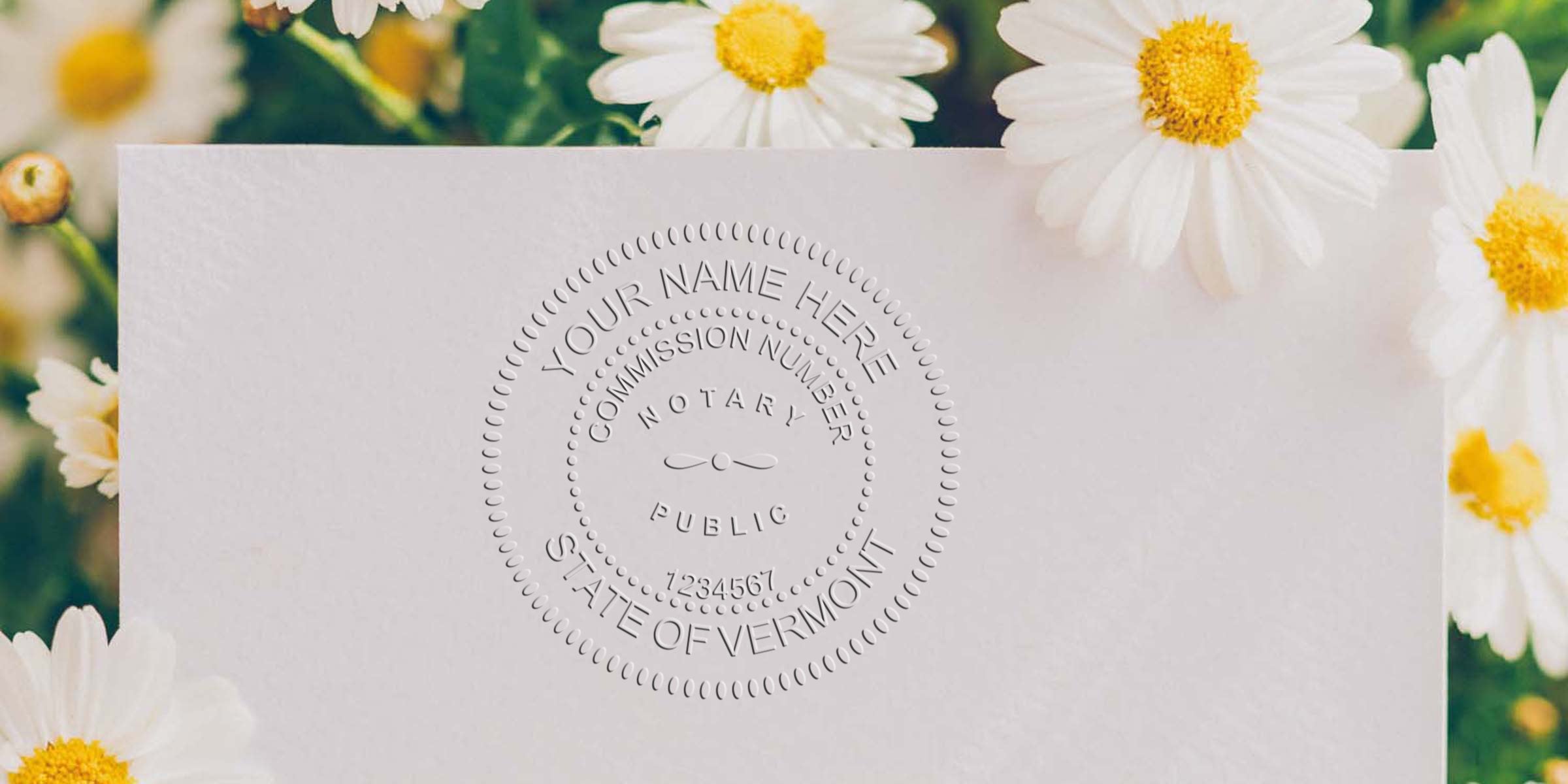Embossed notary seal on white paper reading "State of Vermont" with daisies and green foliage in soft floral background