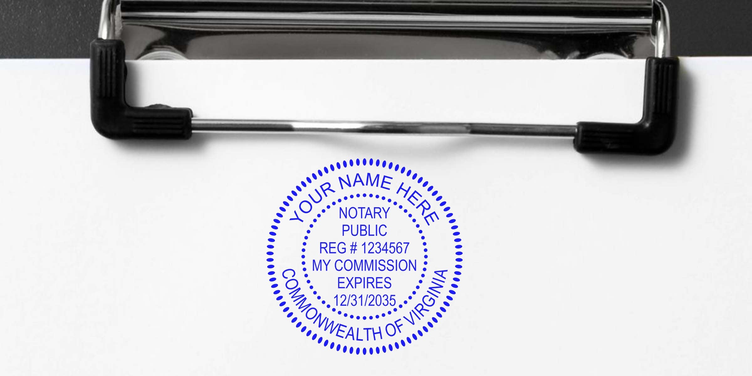 Clipboard with blank paper clipped at top and a blue circular Notary Public stamp showing registration number and commission expiration, Commonwealth of Virginia