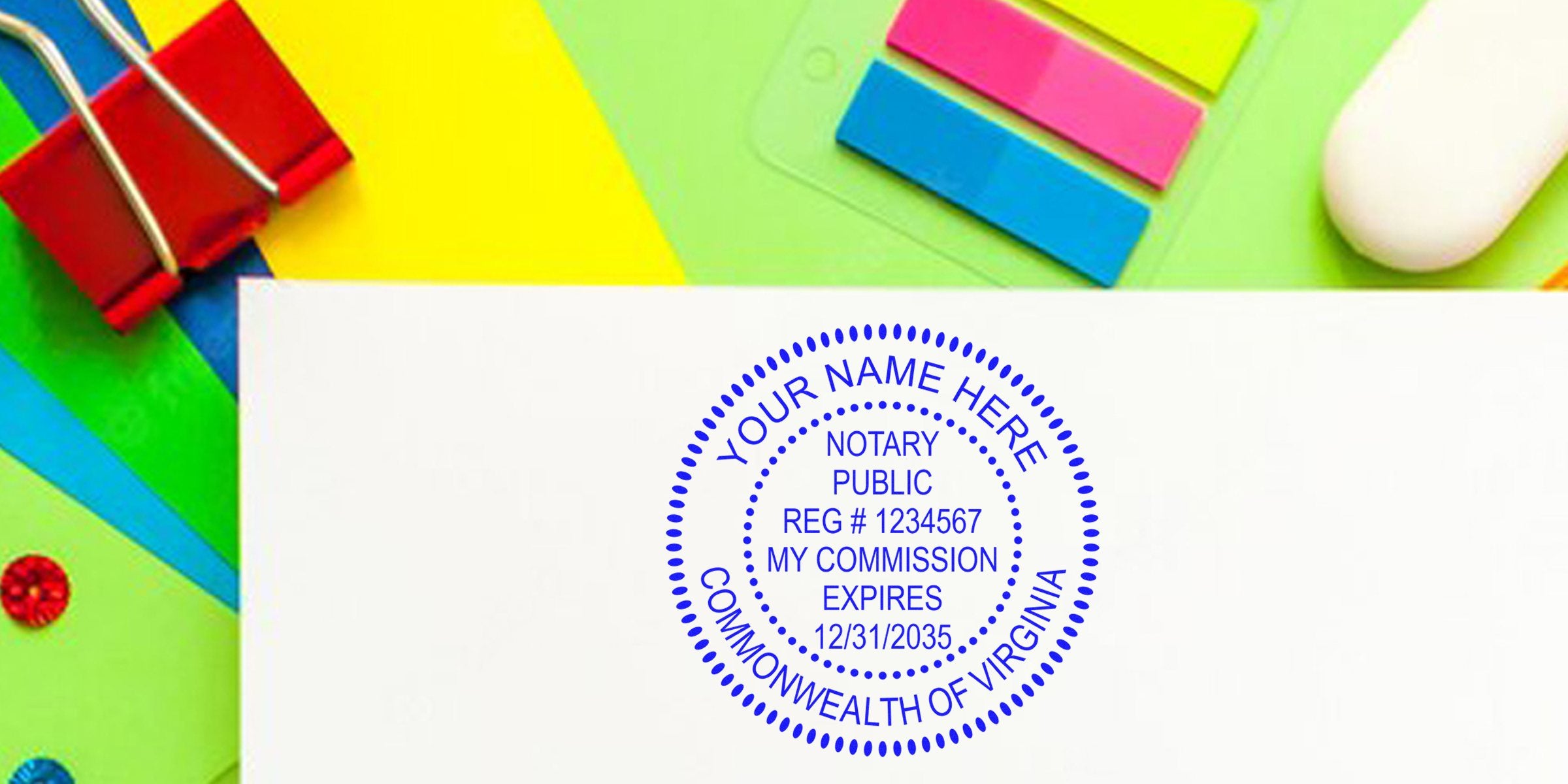 Blue circular notary stamp reading "Notary Public, Reg #1234567, My Commission Expires 12/31/2035, Commonwealth of Virginia" on white paper with colorful office supplies background