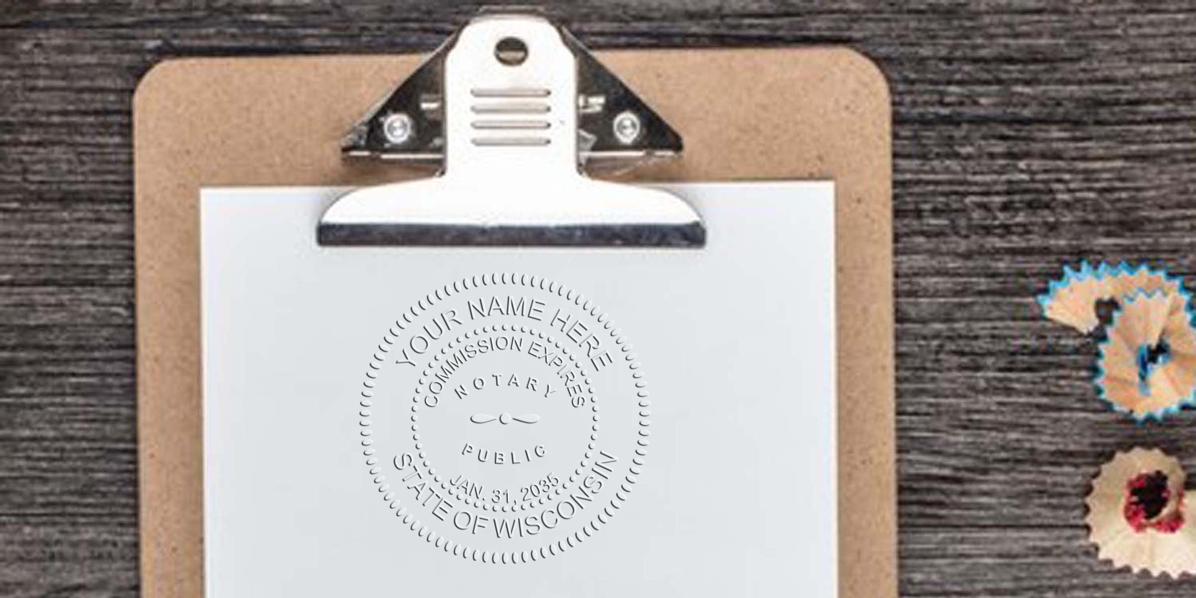 Top-down photo of a clipboard with blank paper embossed by a round notary seal, on a rustic wood table with colorful pencil shavings nearby