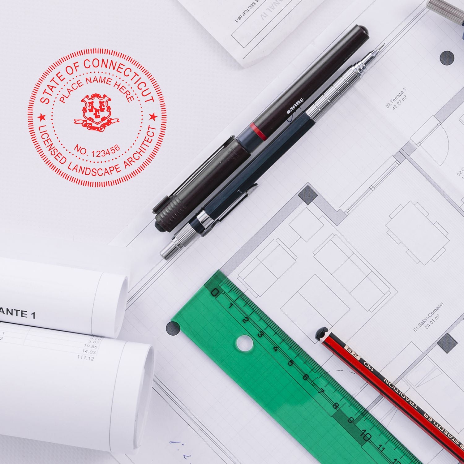 Connecticut Landscape Architect Feature Image: Architectural plans, pens, ruler, and a red Connecticut landscape architect seal stamp on a desk.